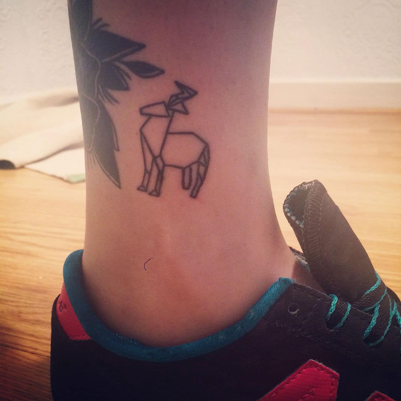 21 Incredible And Colorful Origami Tattoos