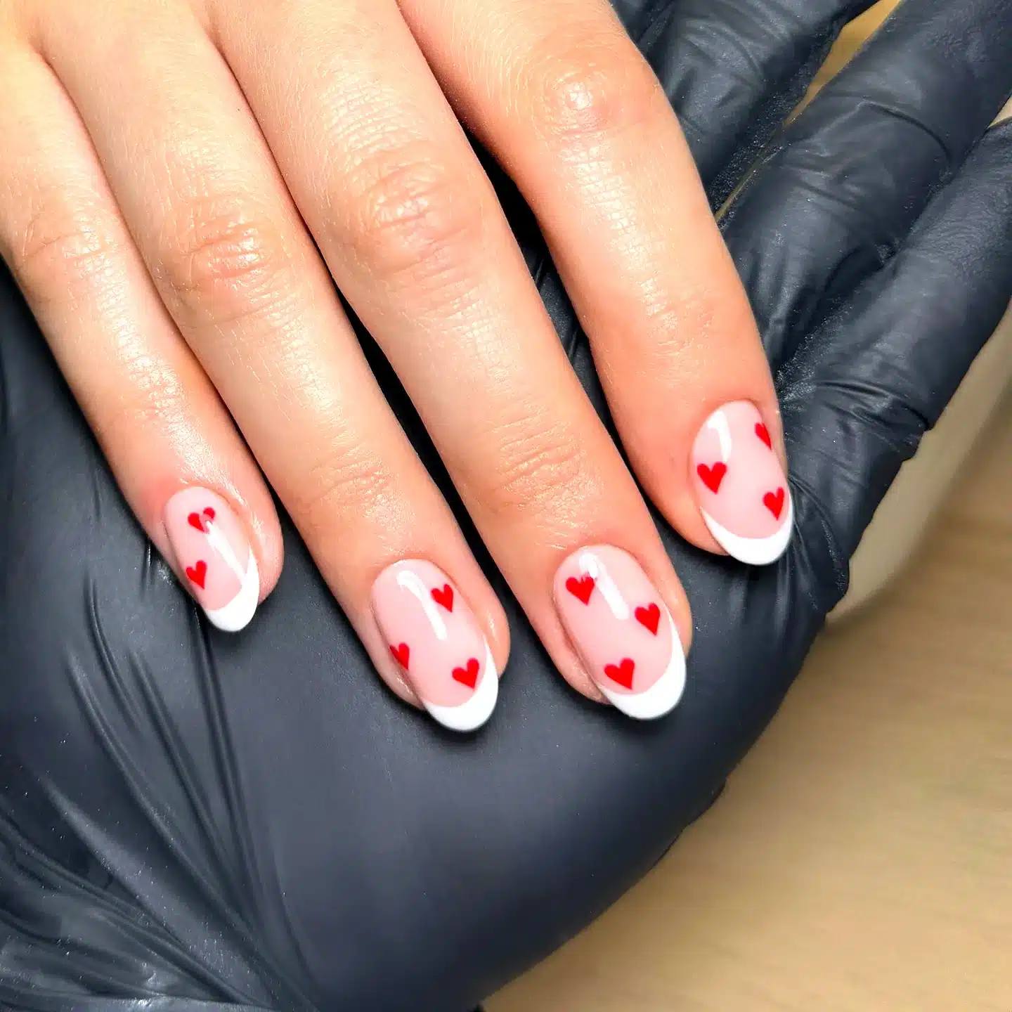 Adorable Almond Shaped French Heart Nails with Bright Red Hearts and Clean White Tips