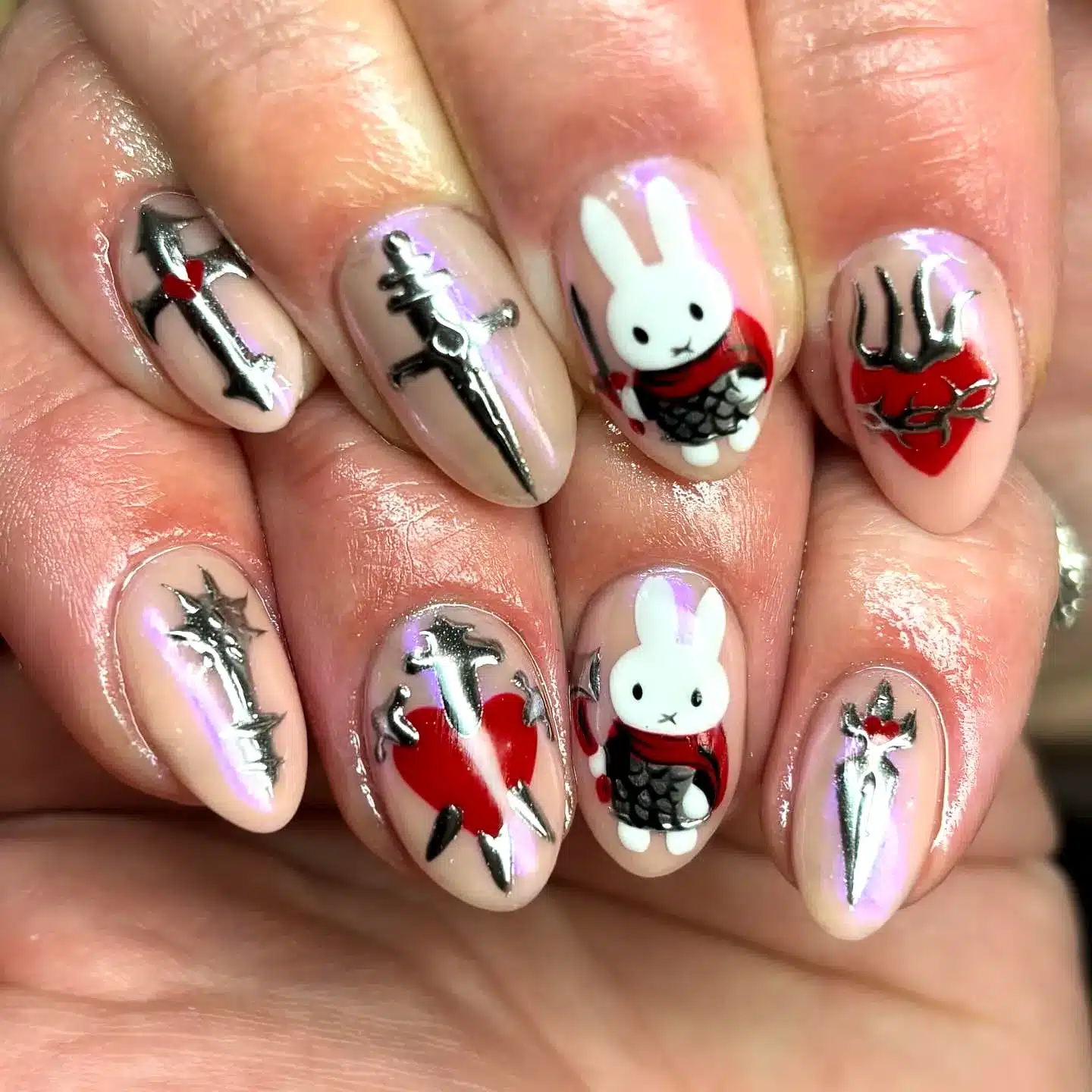 Adorable Almond-Shaped Halloween Nails for Kids Featuring Whimsical Armor Bunnies and Bold Red Hearts