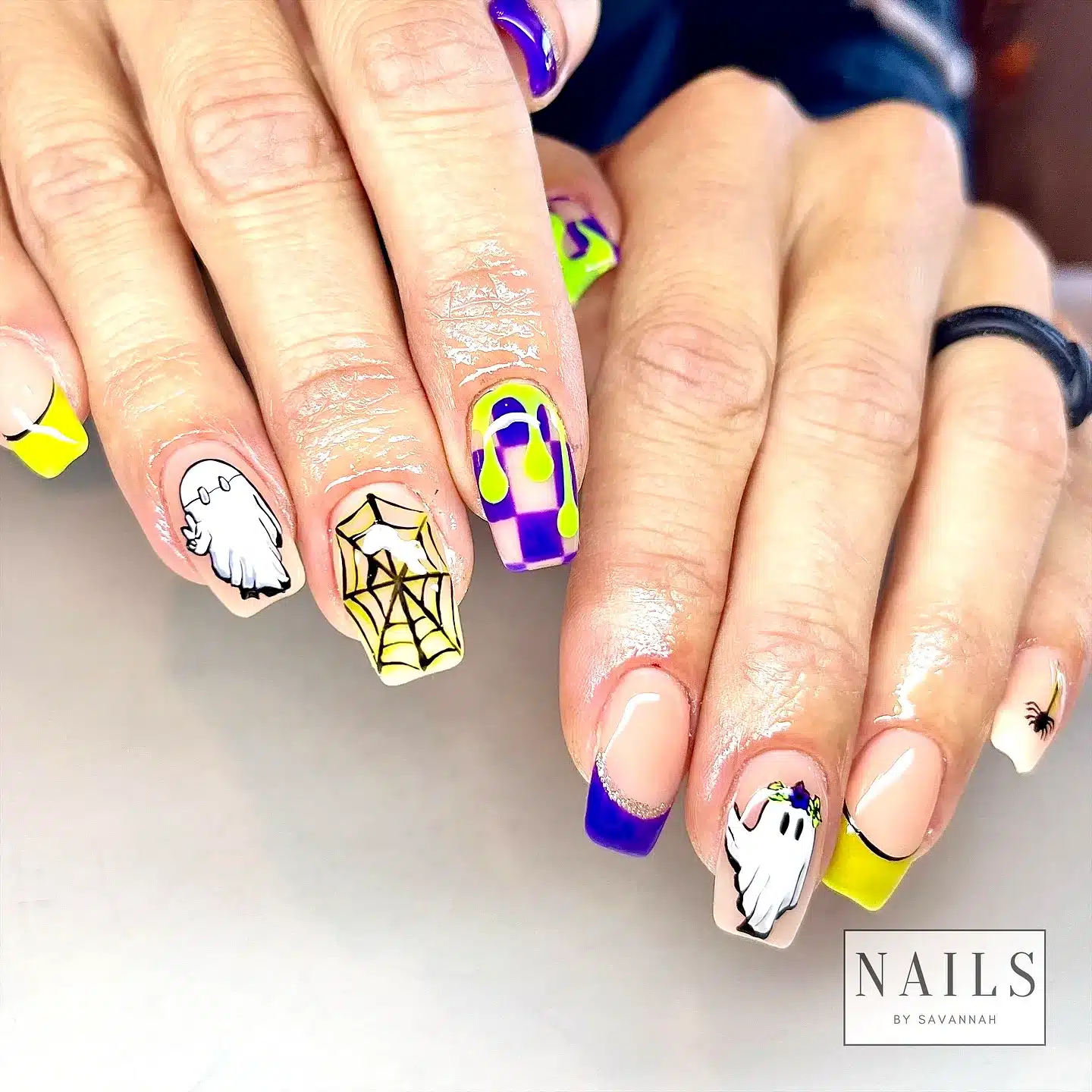Adorable Stiletto Ghost Nail Designs with Spooky Illustrations and Vibrant Tips