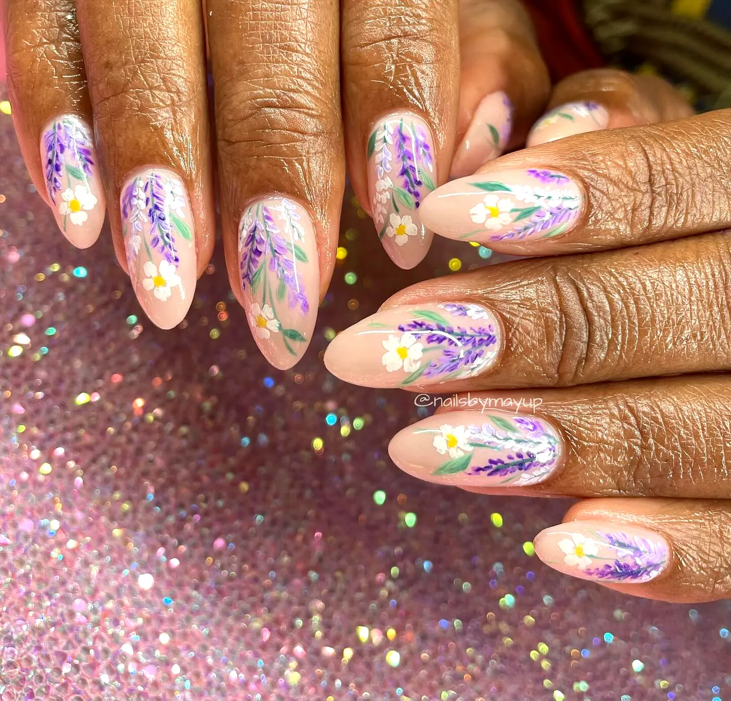 Charming Almond Lavender Flower Nails with Floral Patterns and Shimmering Elegance