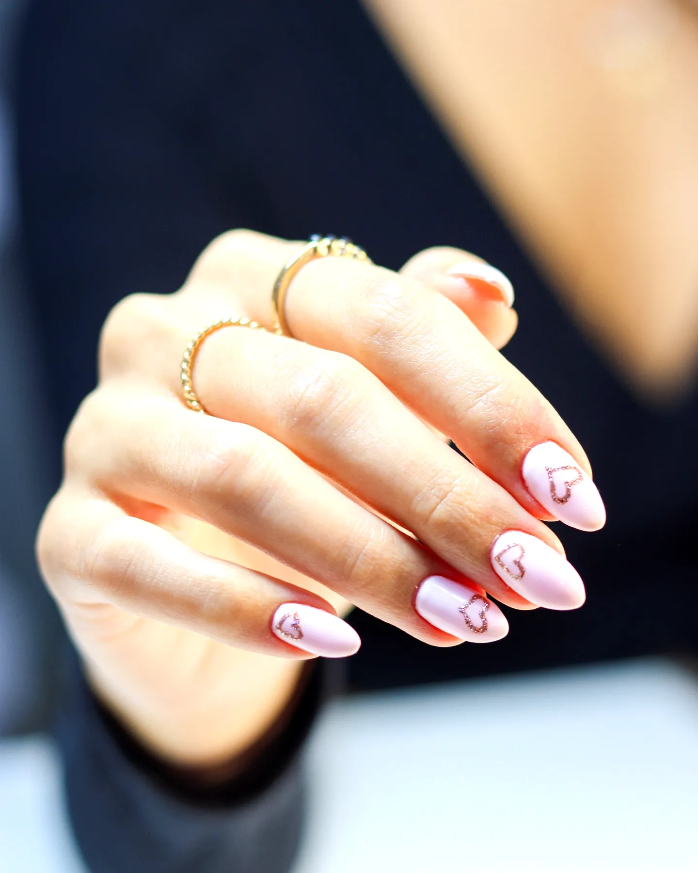 Charming Almond Shaped Soft Pink Ring Finger Heart Nails with Delicate Shimmering Patterns