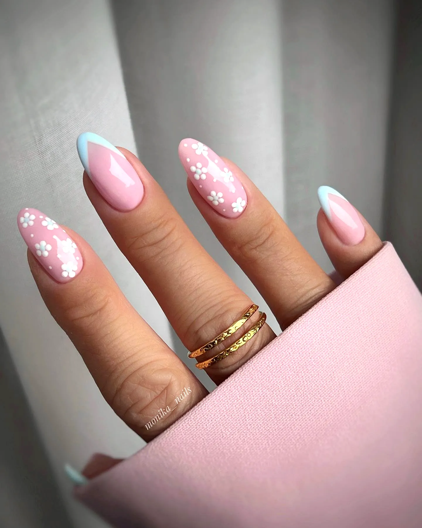 Charming Almond Shaped Spring Classy Nails with Soft Pink and Light Blue French Tips and Delicate White Flowers
