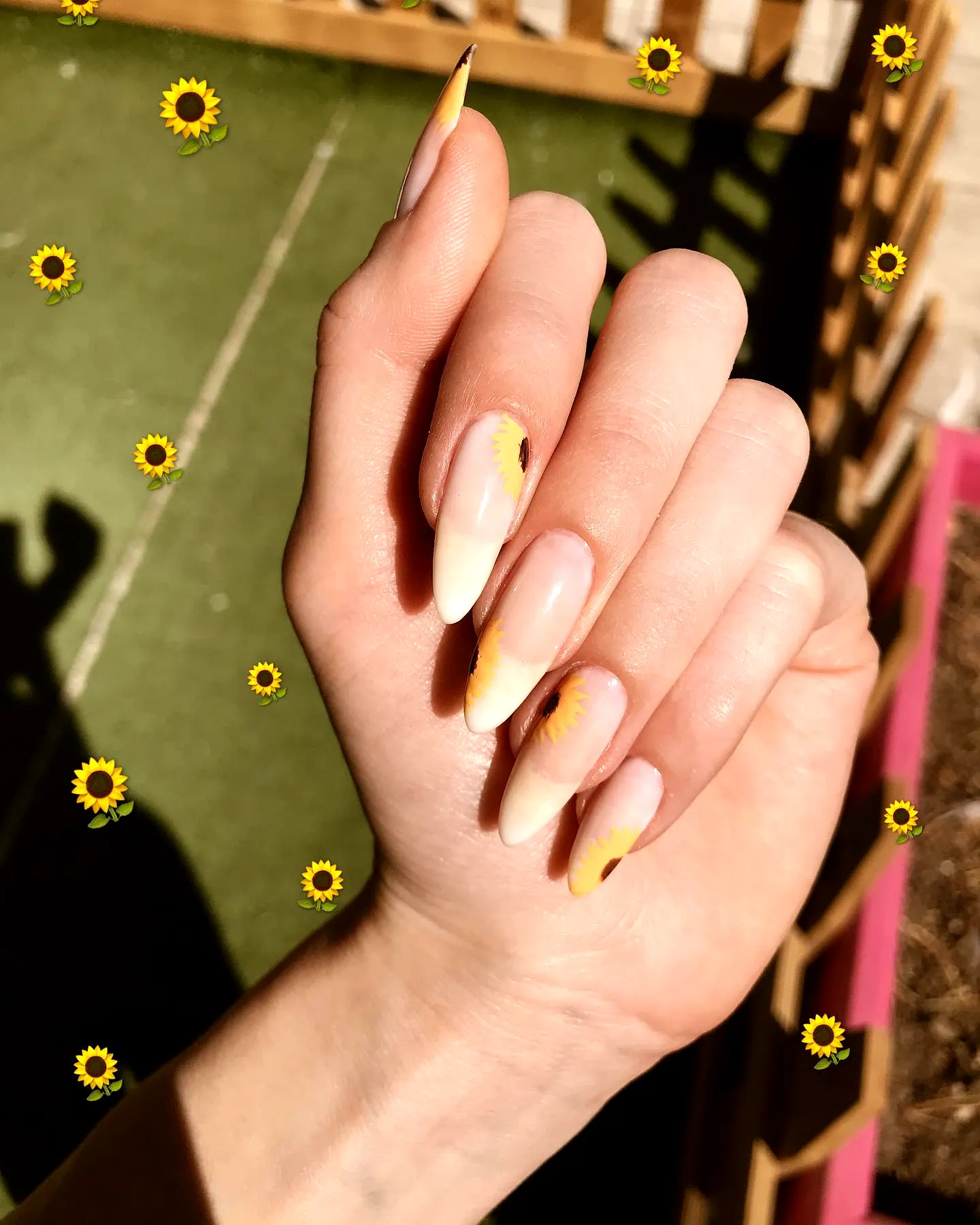 Charming Almond Sunflower Nail Designs with Vibrant Yellow Tips and Floral Art Elements