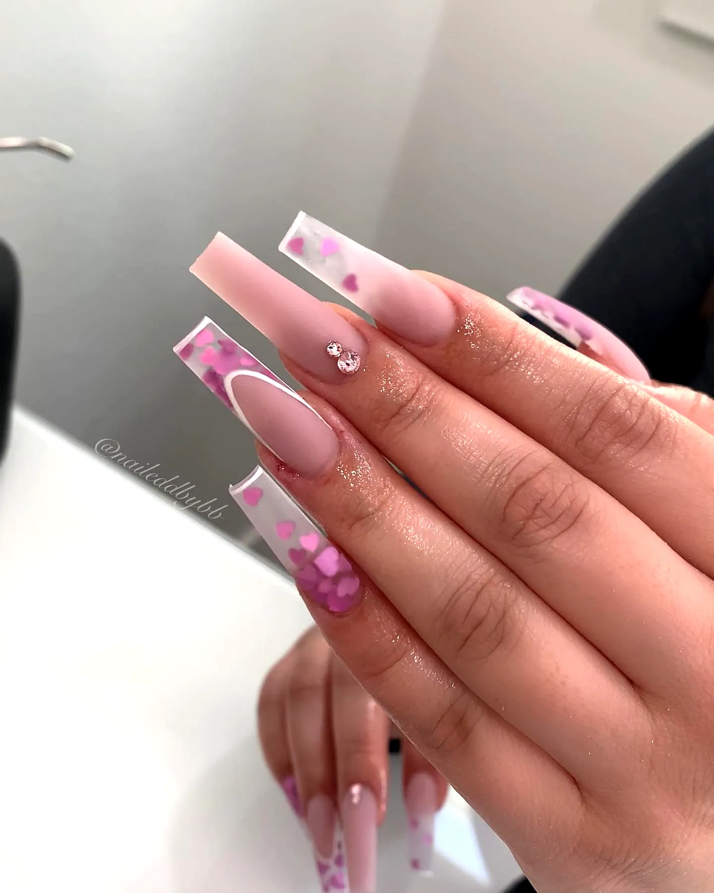 Charming Coffin Shaped Pink Heart Nails with Floral Patterns and Gem Embellishments
