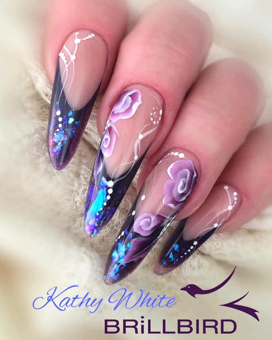 Charming Gothic Almond Nails with Purple Gradient Floral Patterns and Gem Accents
