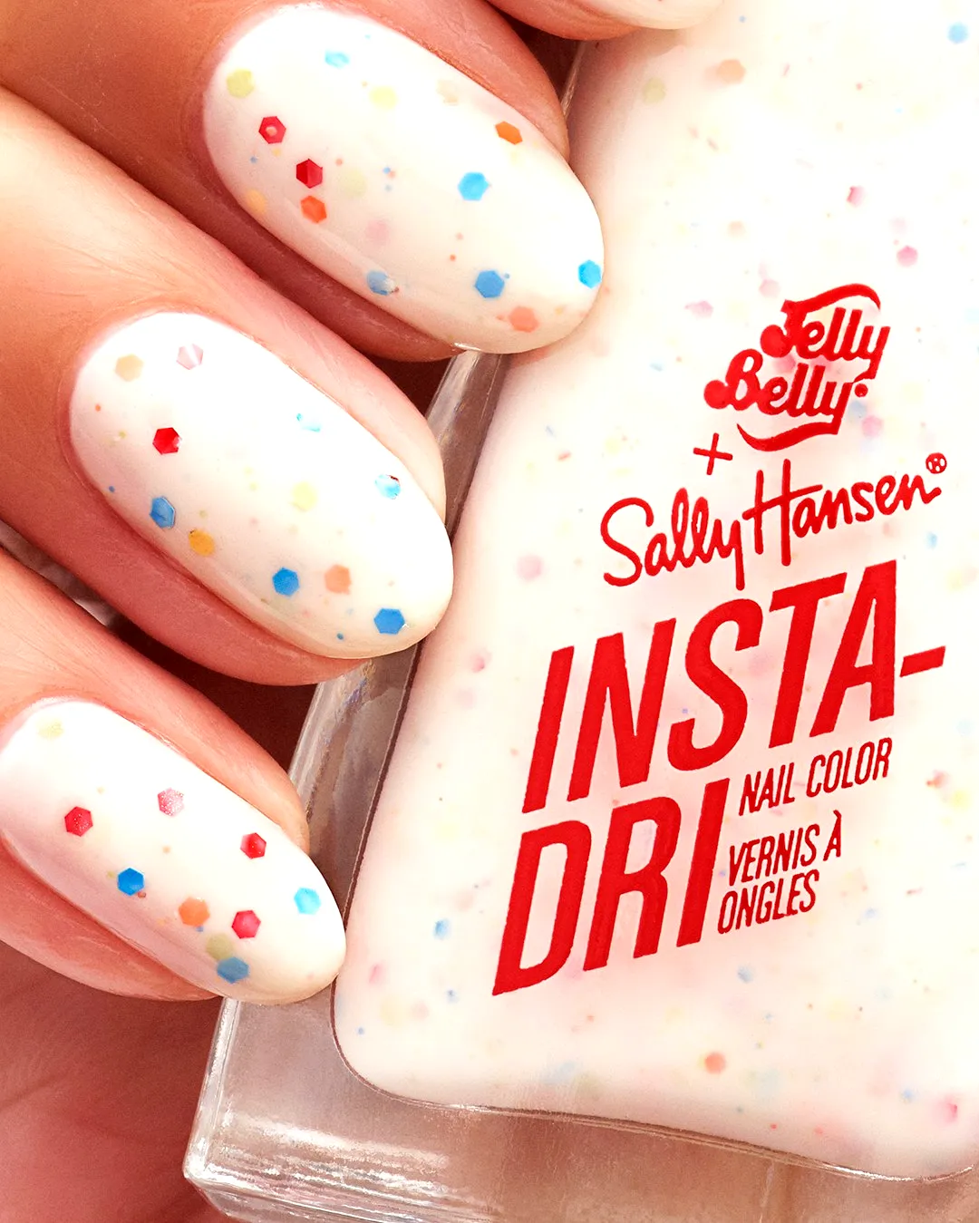 Charming Oval Birthday Cake Nails with Creamy White Base and Colorful Confetti Specks