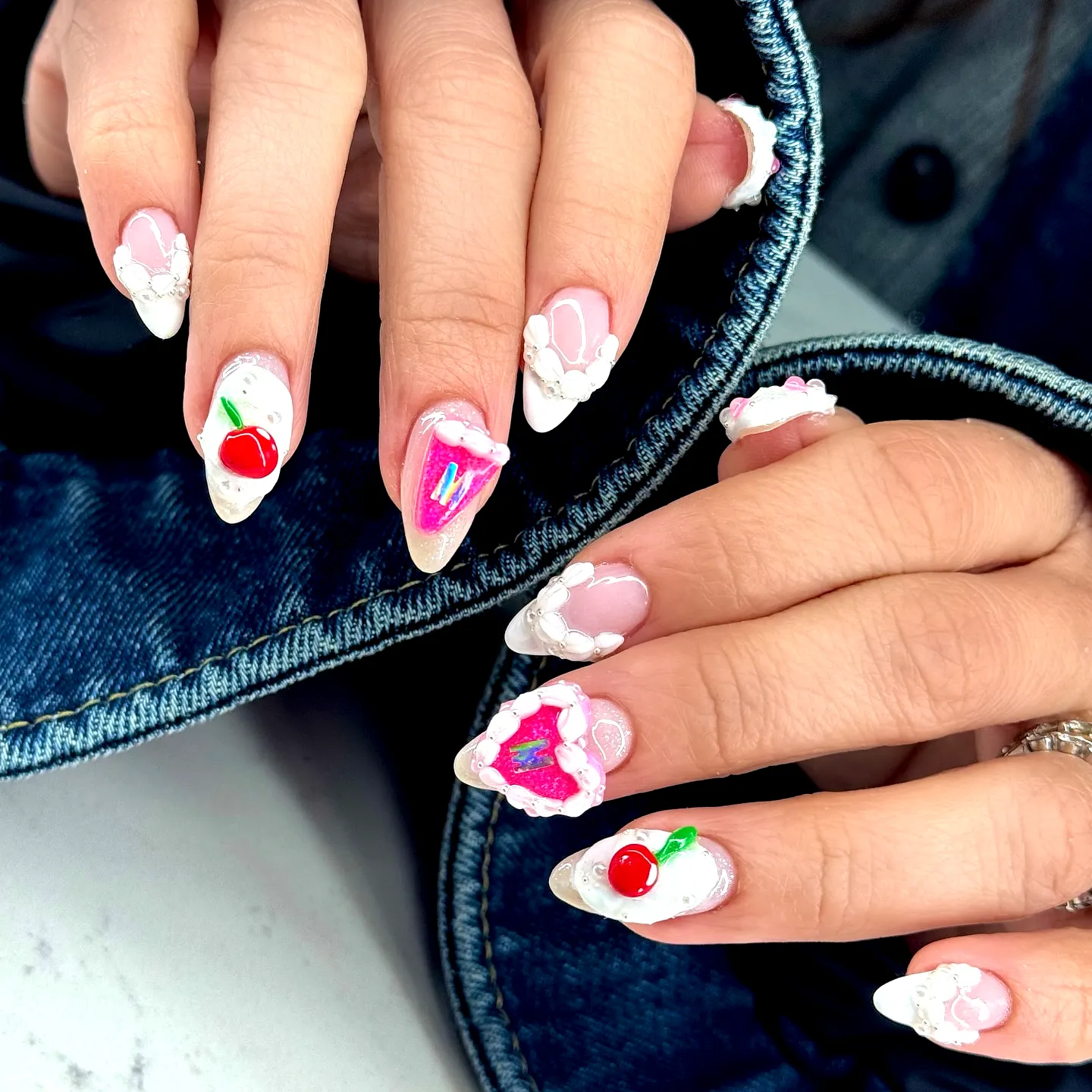 Charming Pointed Birthday Cake Nails with Pink and White Tips Adorned with 3D Dessert Art