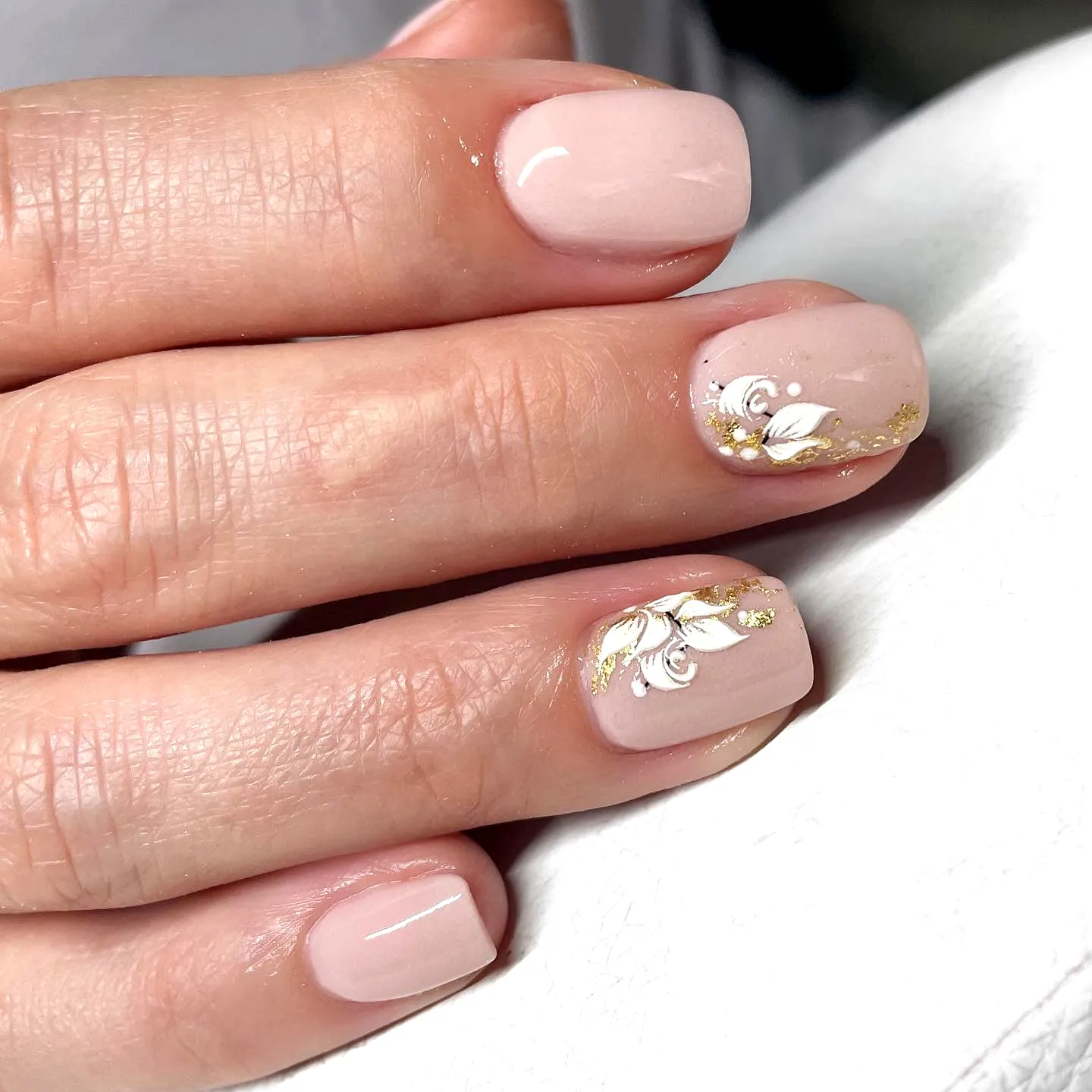 Charming Square Gothic Easter Nails with Soft Pink Base Elegant White Floral Patterns and Gold Accents