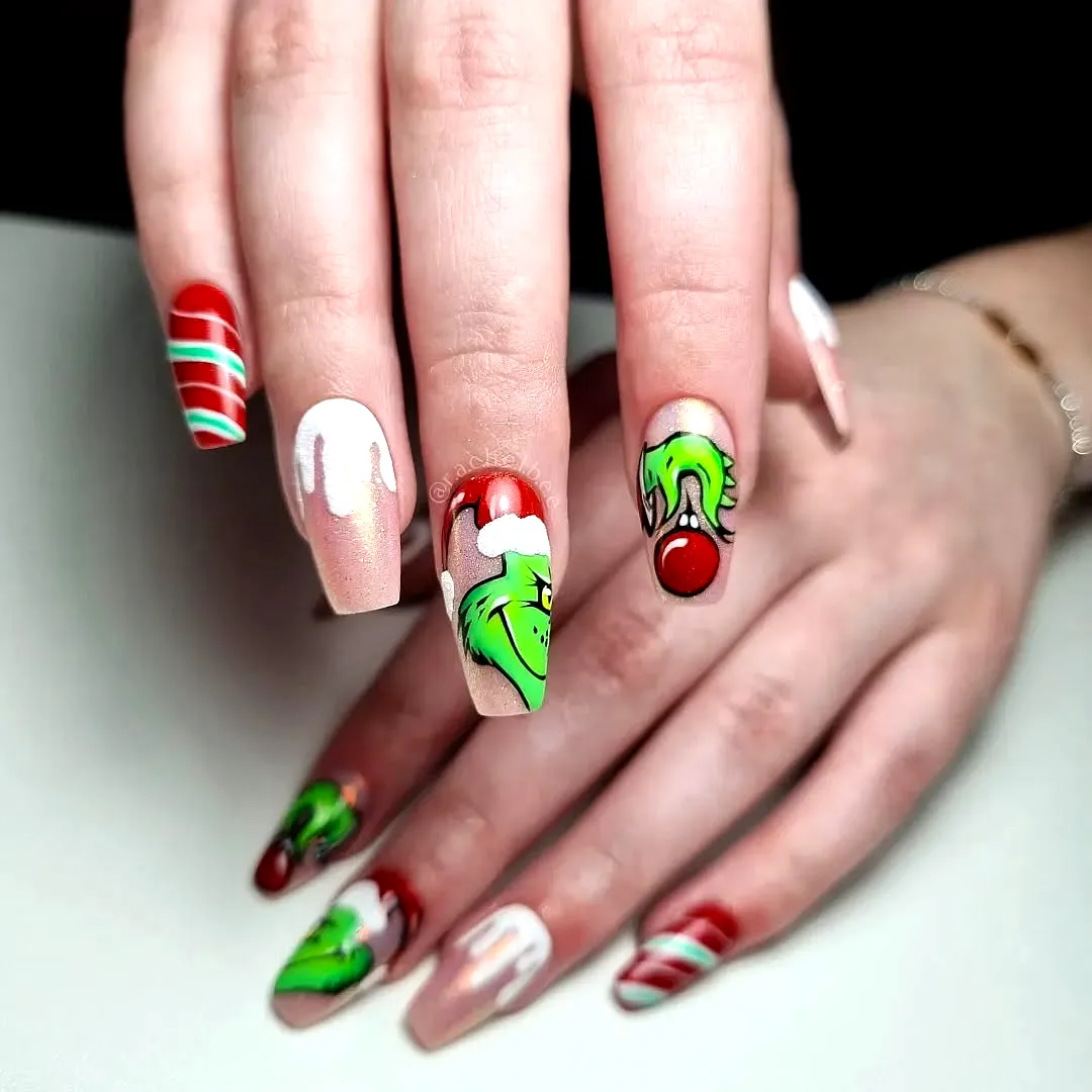 Cheerful Coffin Ballerina Nails with Festive Grinch Design in Green Red and Cream