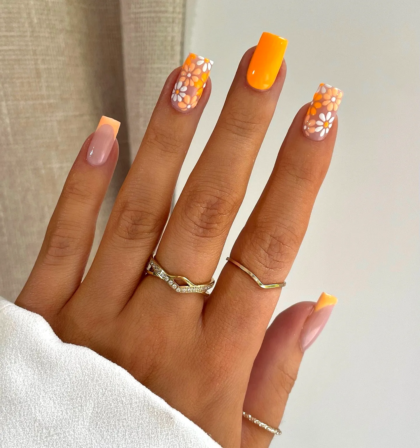Cheerful Square Orange Nails with Daisies and Gradient Nude Style