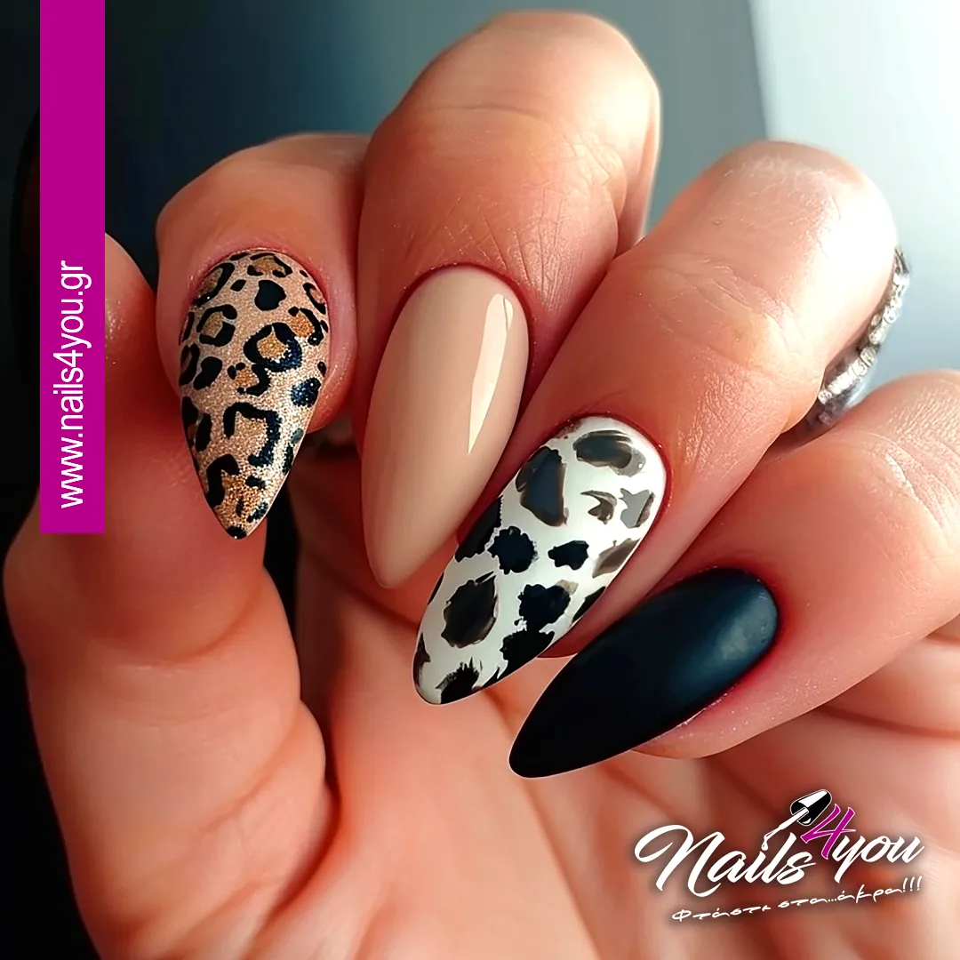 Chic Almond Shaped Animal Print Nails with Nude Black and Gold Accents