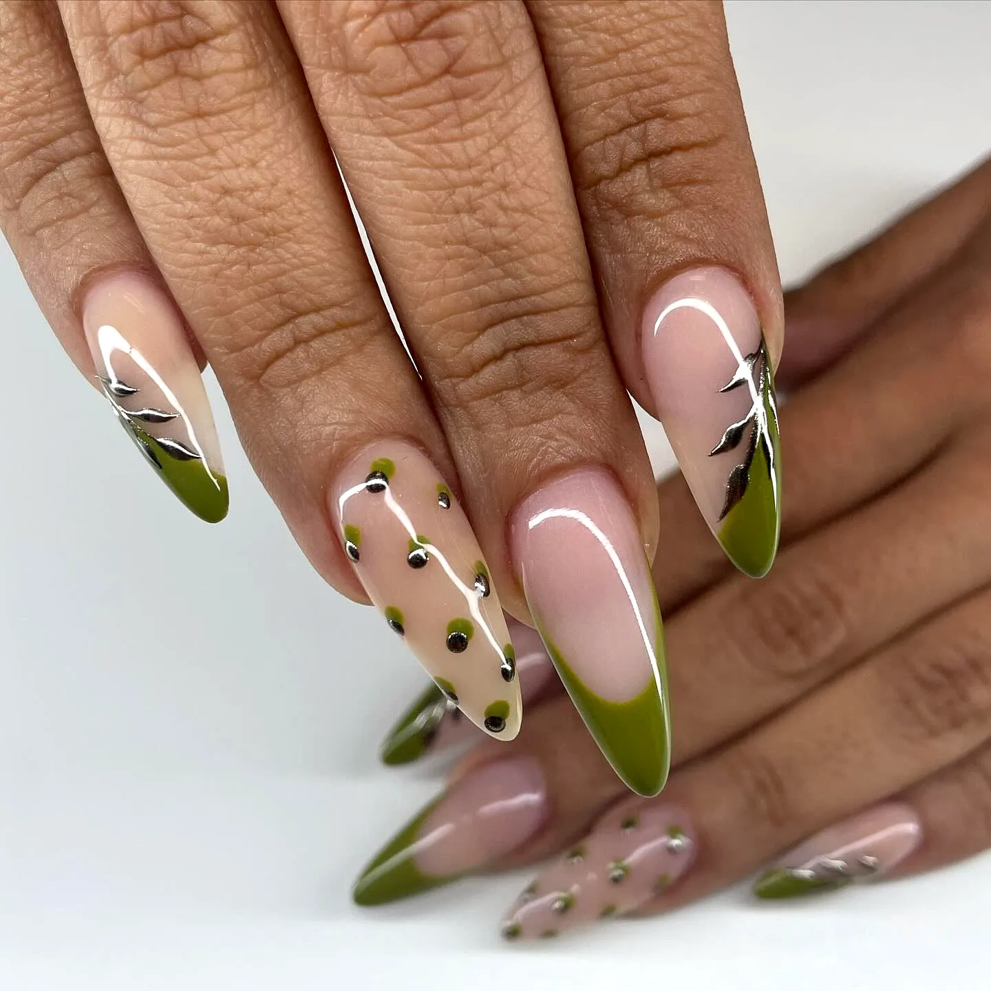 Chic Almond Shaped Olive Green Nails with Metallic Leaf Patterns and Elegant Embellishments