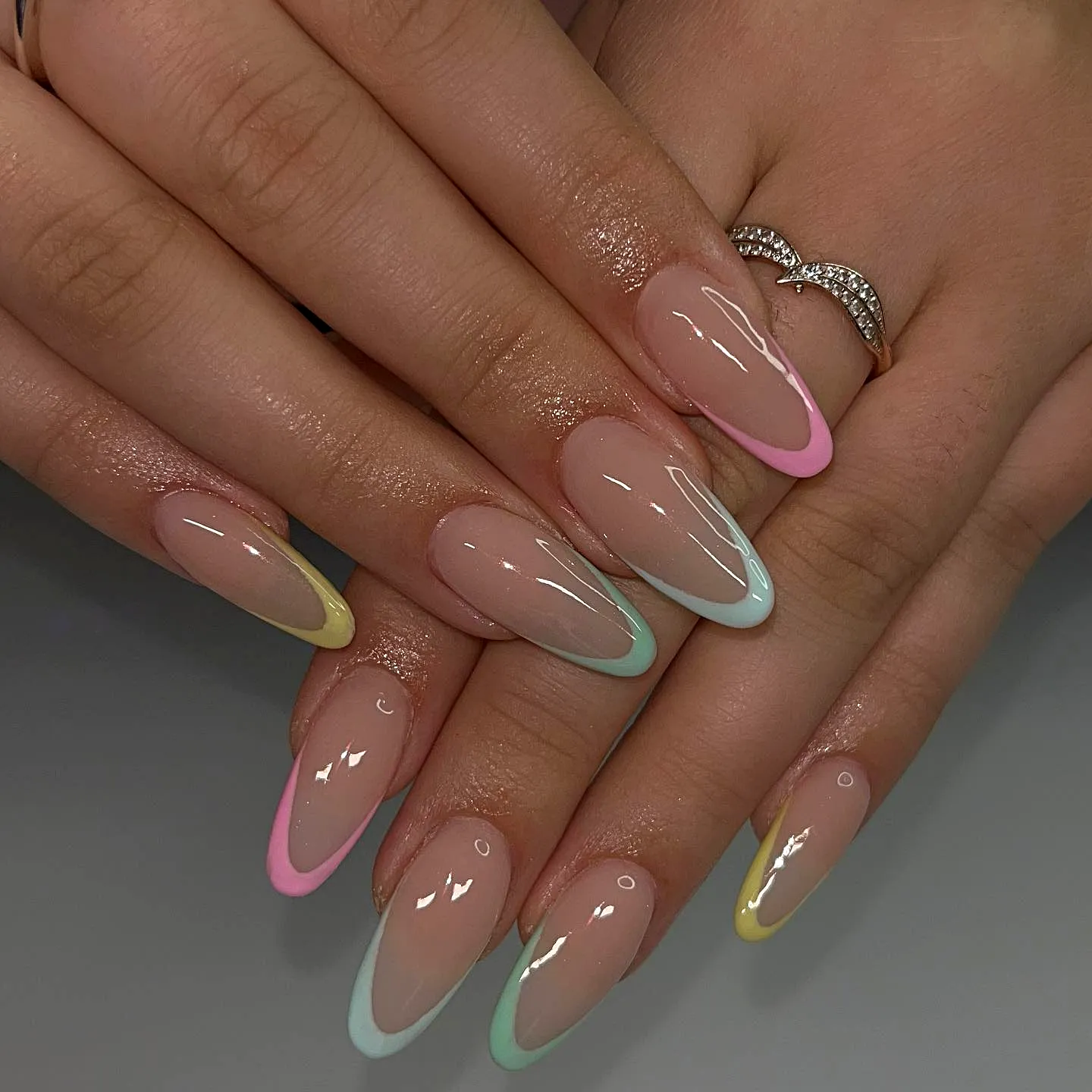 Chic Almond Shaped Spring Classy Nails with Vibrant Pastel French Tips