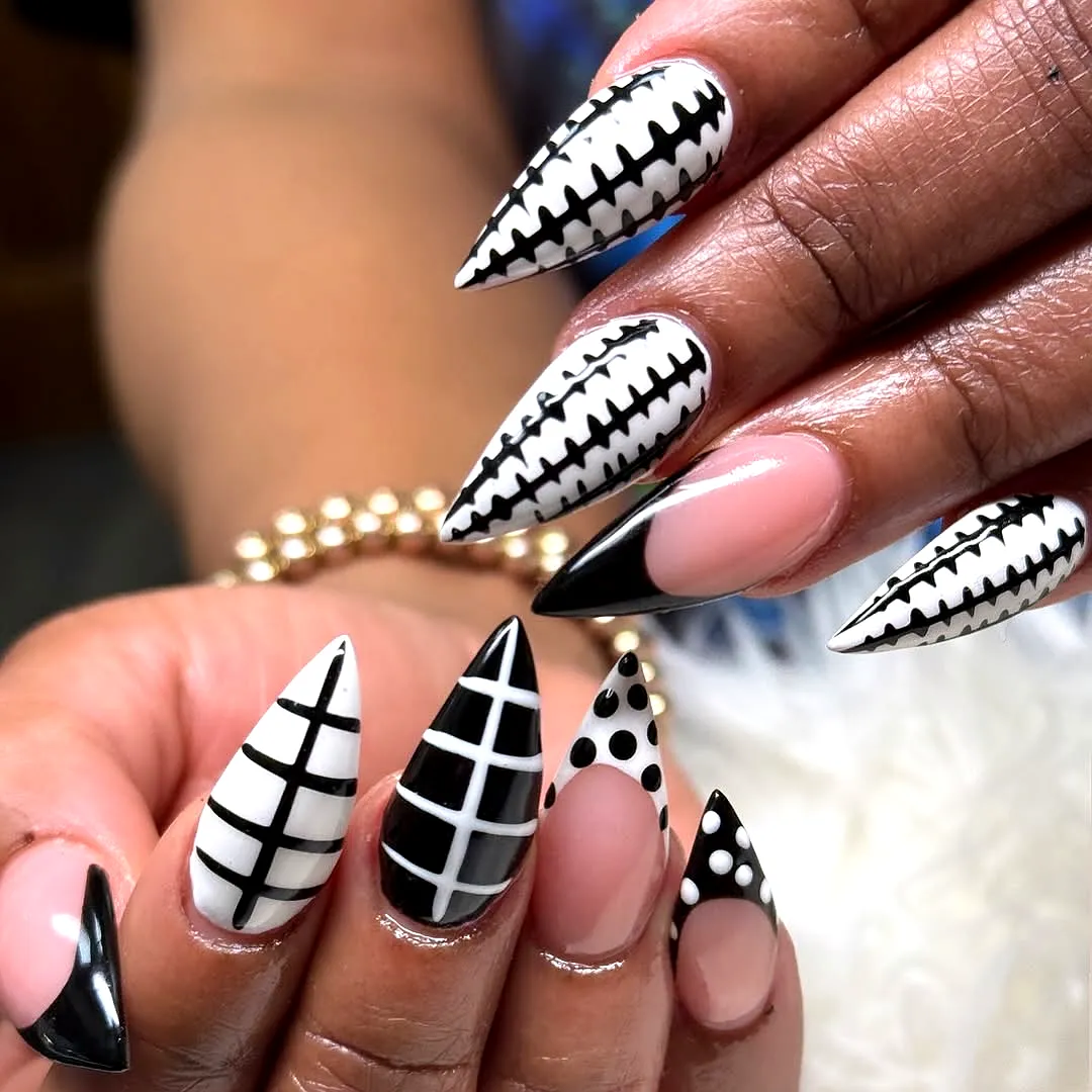 Chic Pointed Black and White Polka Dot Nails with Geometric Patterns
