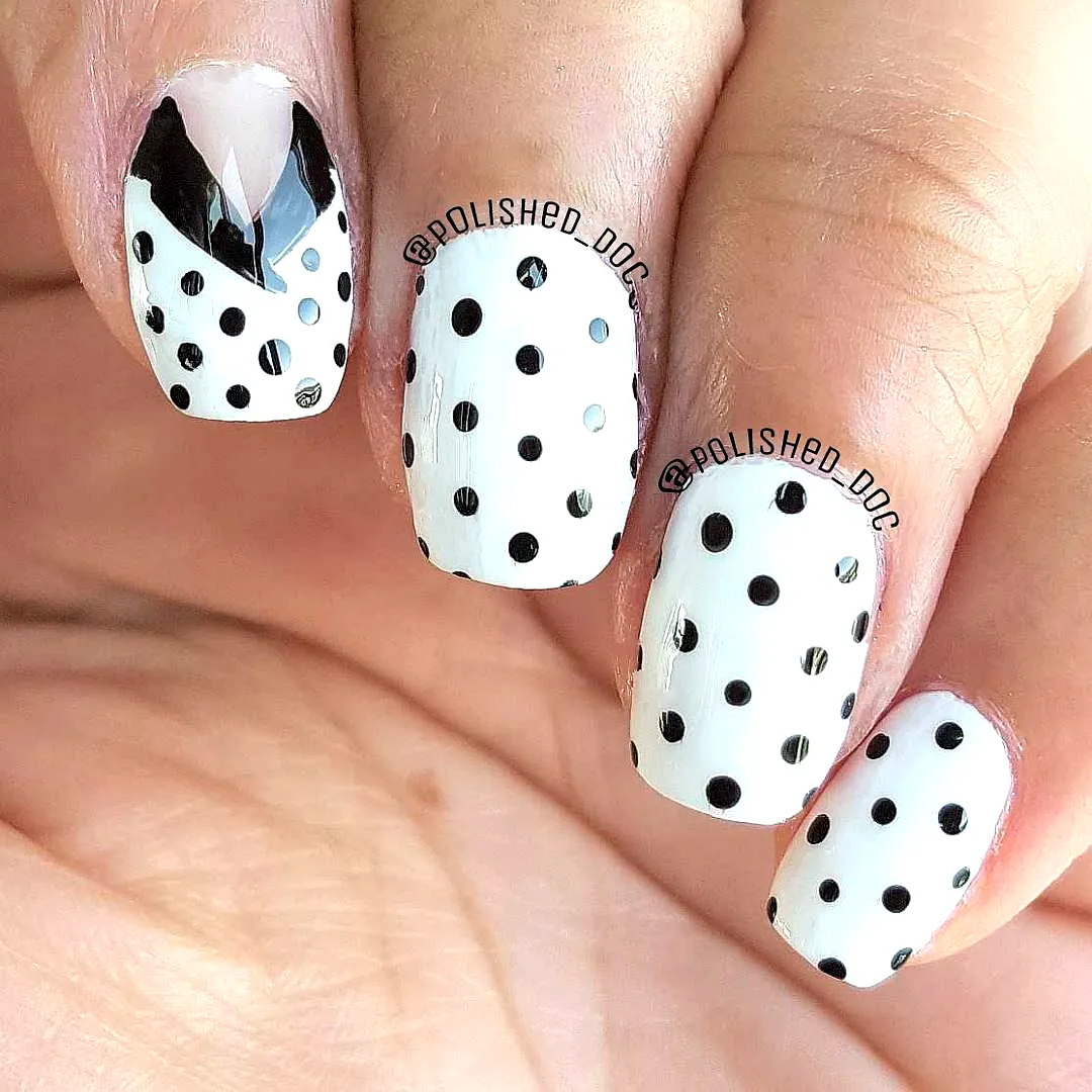 Chic Squared Black and White Polka Dot Nails with Glossy Finish and Unique Negative Space Design