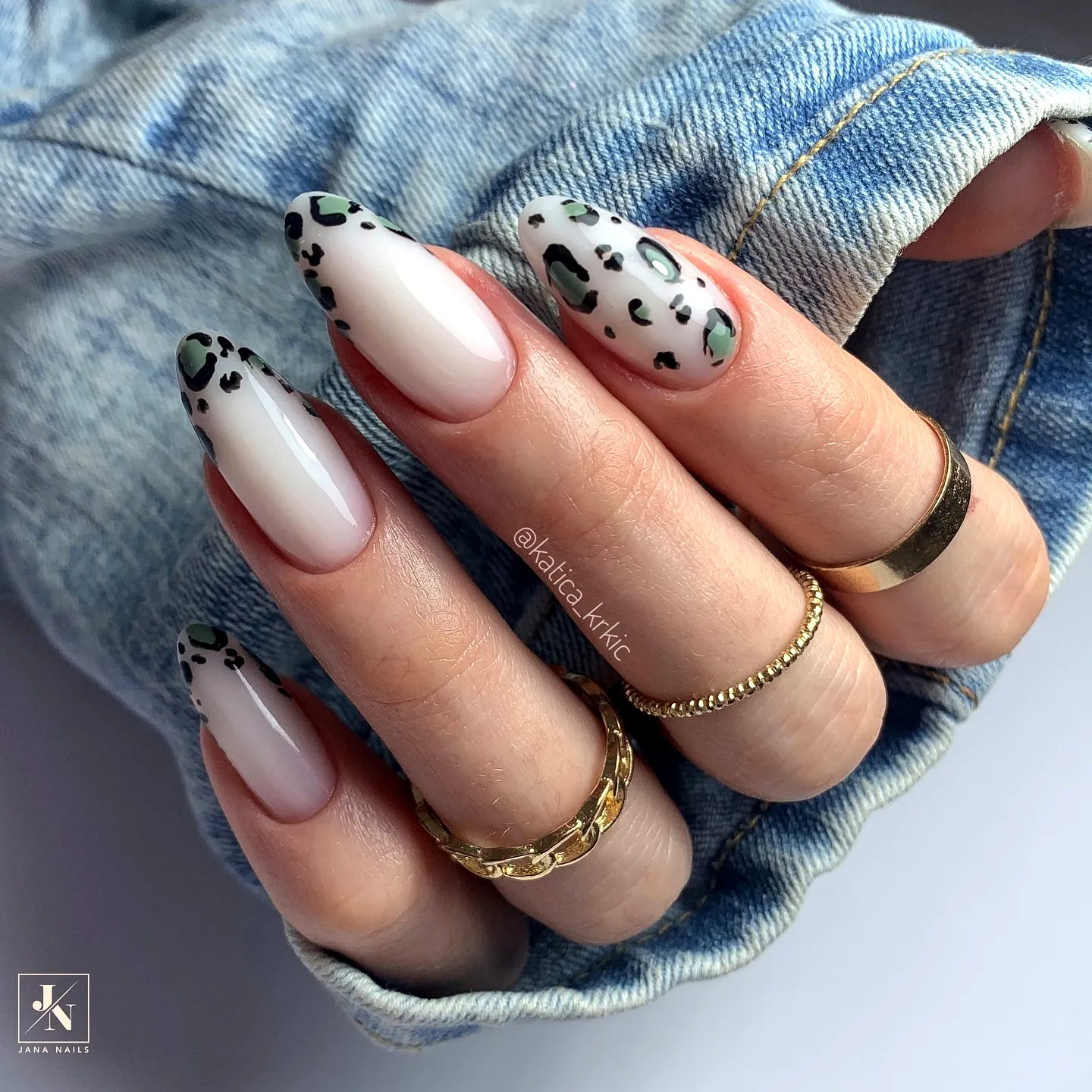 Chic Stiletto Animal Print Nails in Nude with Elegant Leopard Tips and Glossy Finish