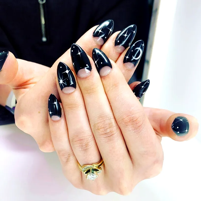 Chic Stiletto Half-moon Nails in Glossy Black with Celestial Patterns