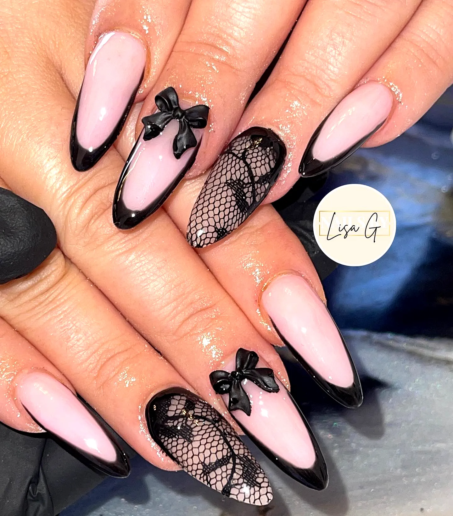 Chic Stiletto Lace Nails with Soft Pink and Glossy Black Elegance