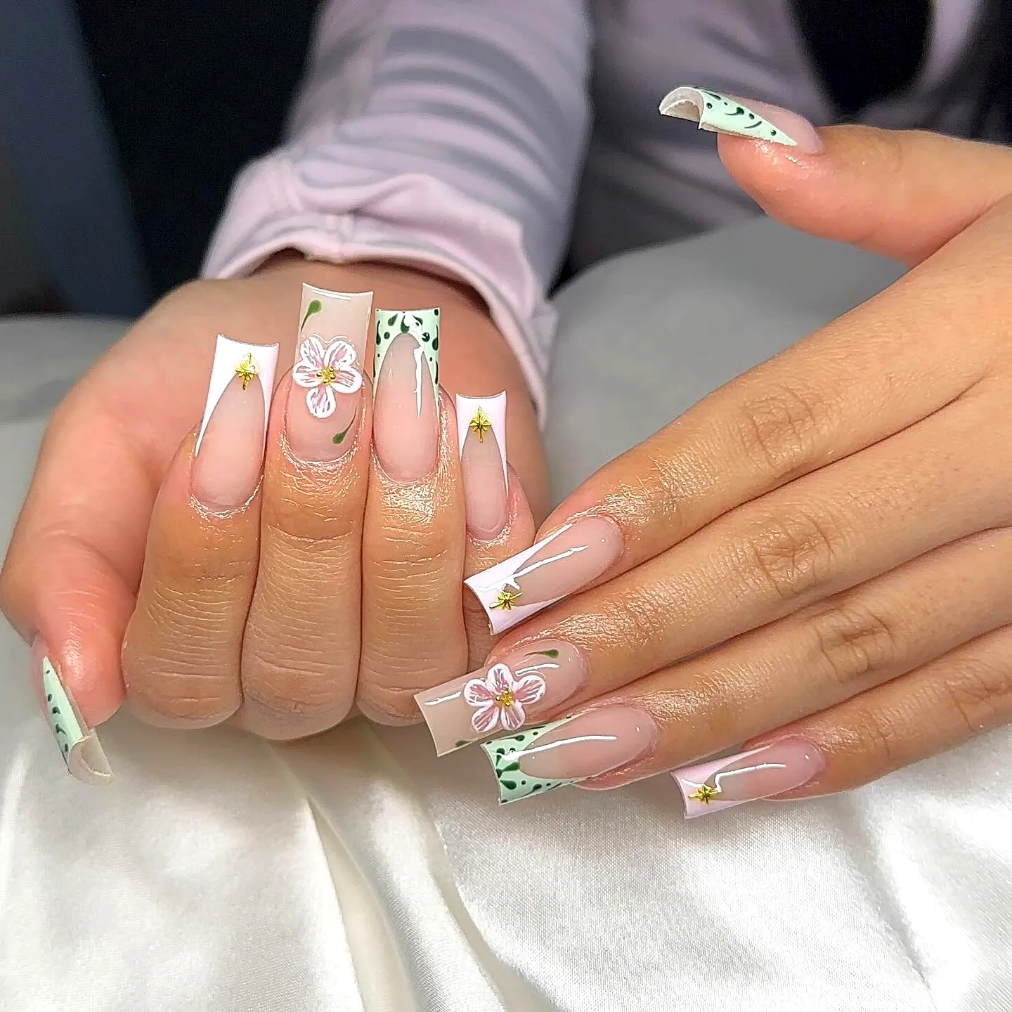 Chic Summer Coffin Nails with Pastel Pink and Mint Green Floral and Geometric Designs