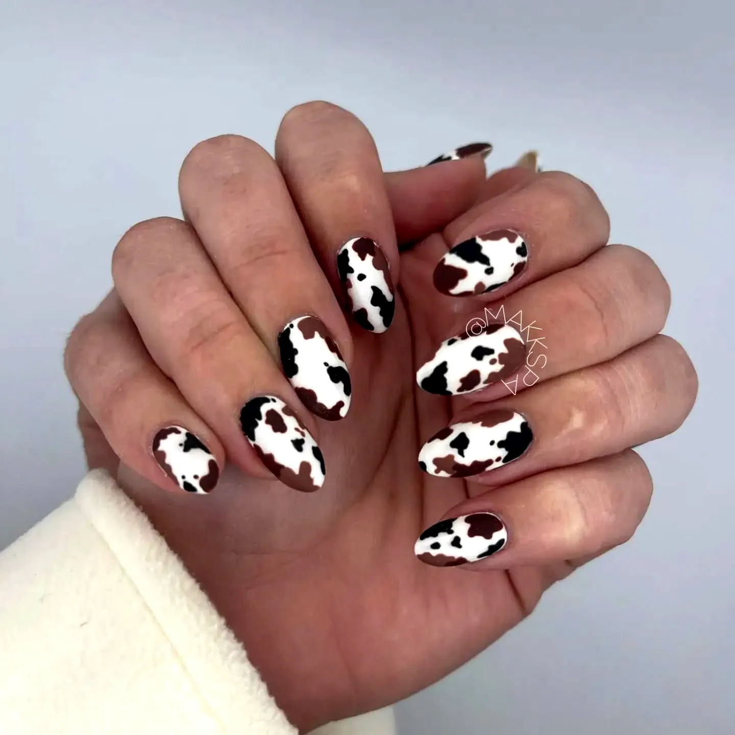 Cute Almond Cow Print Nails in Playful Matte and Glossy Style