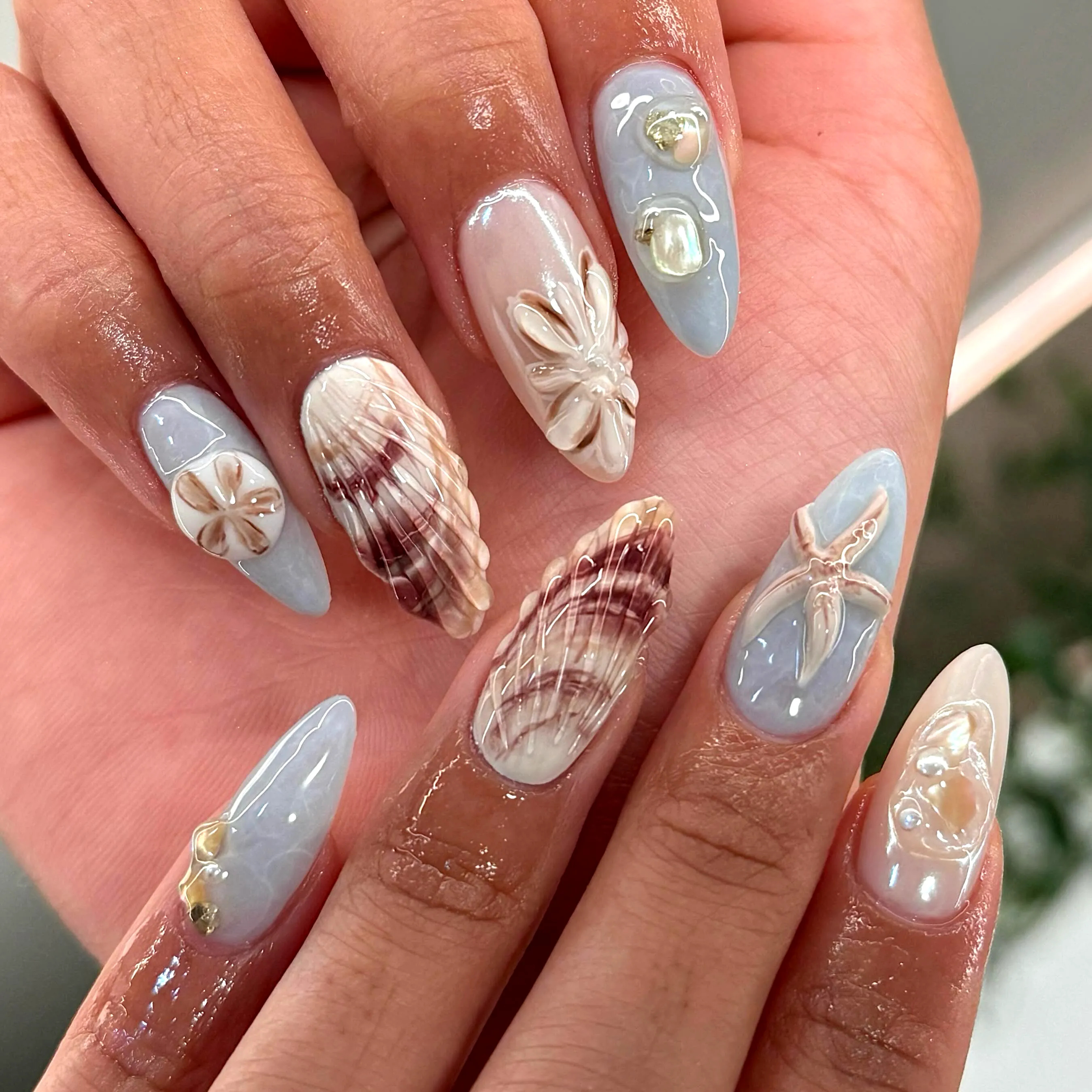 Cute Almond-Shaped Beach Nails in Pastel Blue with 3D Shell and Flower Art