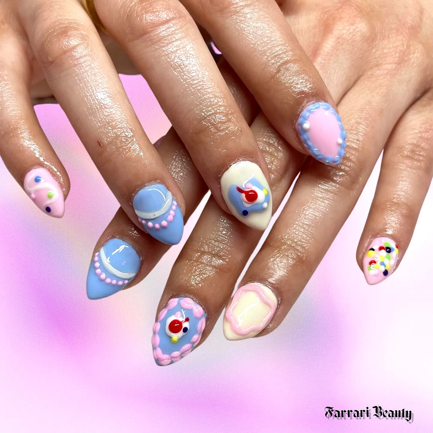 Cute Almond Shaped Birthday Cake Nails in Pastel Colors with Playful Patterns and Whimsical 3D Details