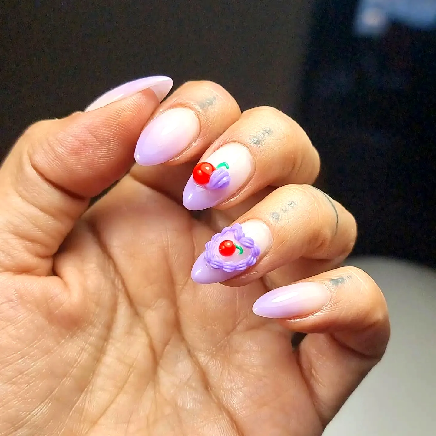 Cute Almond Shaped Birthday Cake Nails with Lavender Base and 3D Floral and Fruit Art
