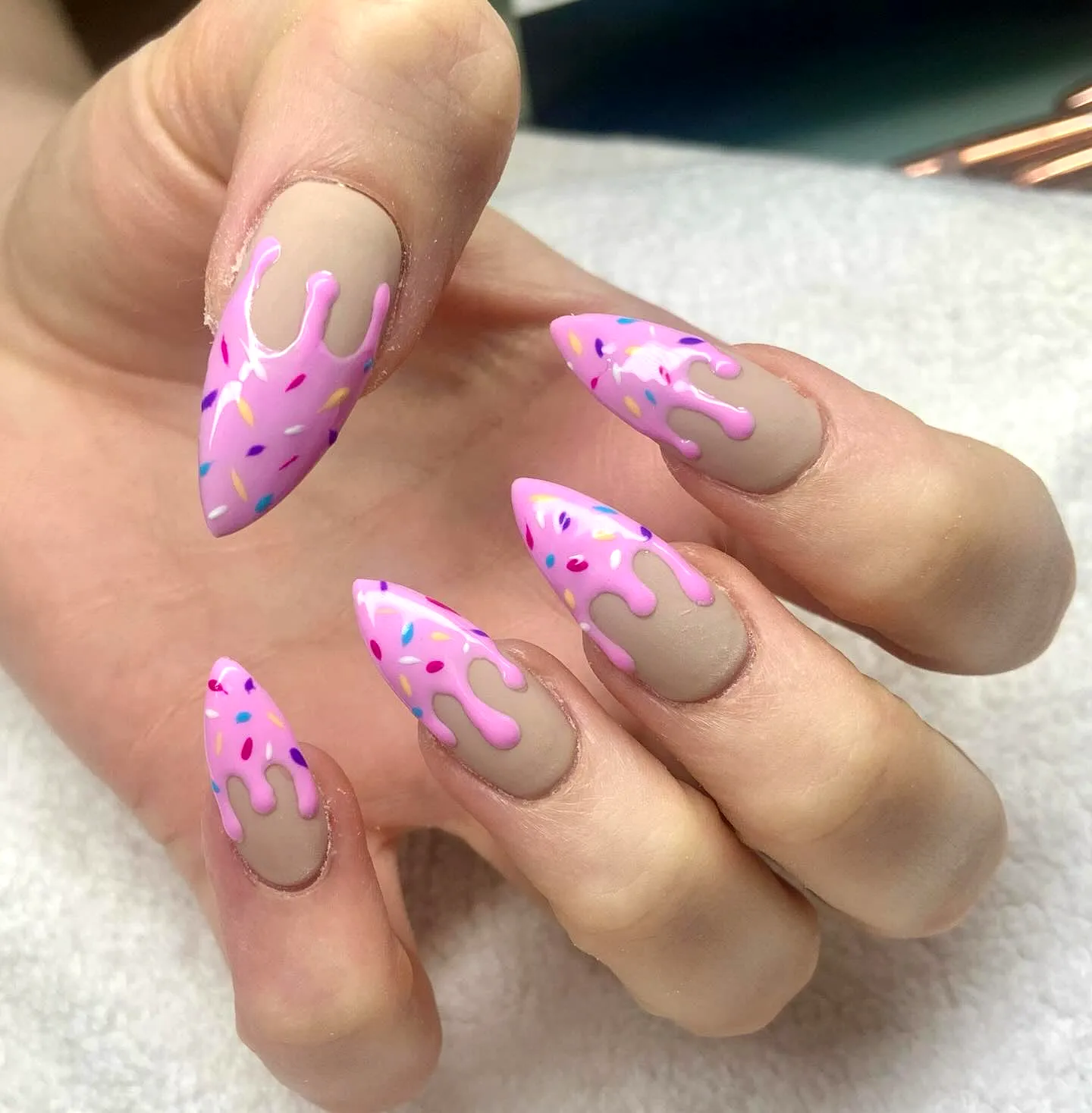 Cute Almond-Shaped Birthday Cake Nails with Neutral Beige Base Pink Drips and Colorful Sprinkles