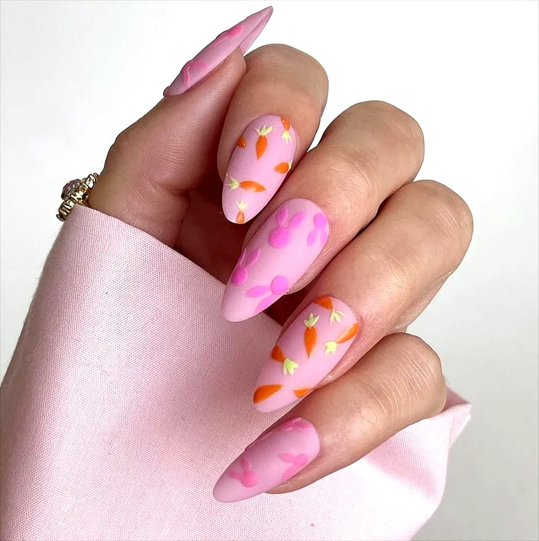 Cute almond shaped Easter nail designs with matte pink finish and colorful floral patterns