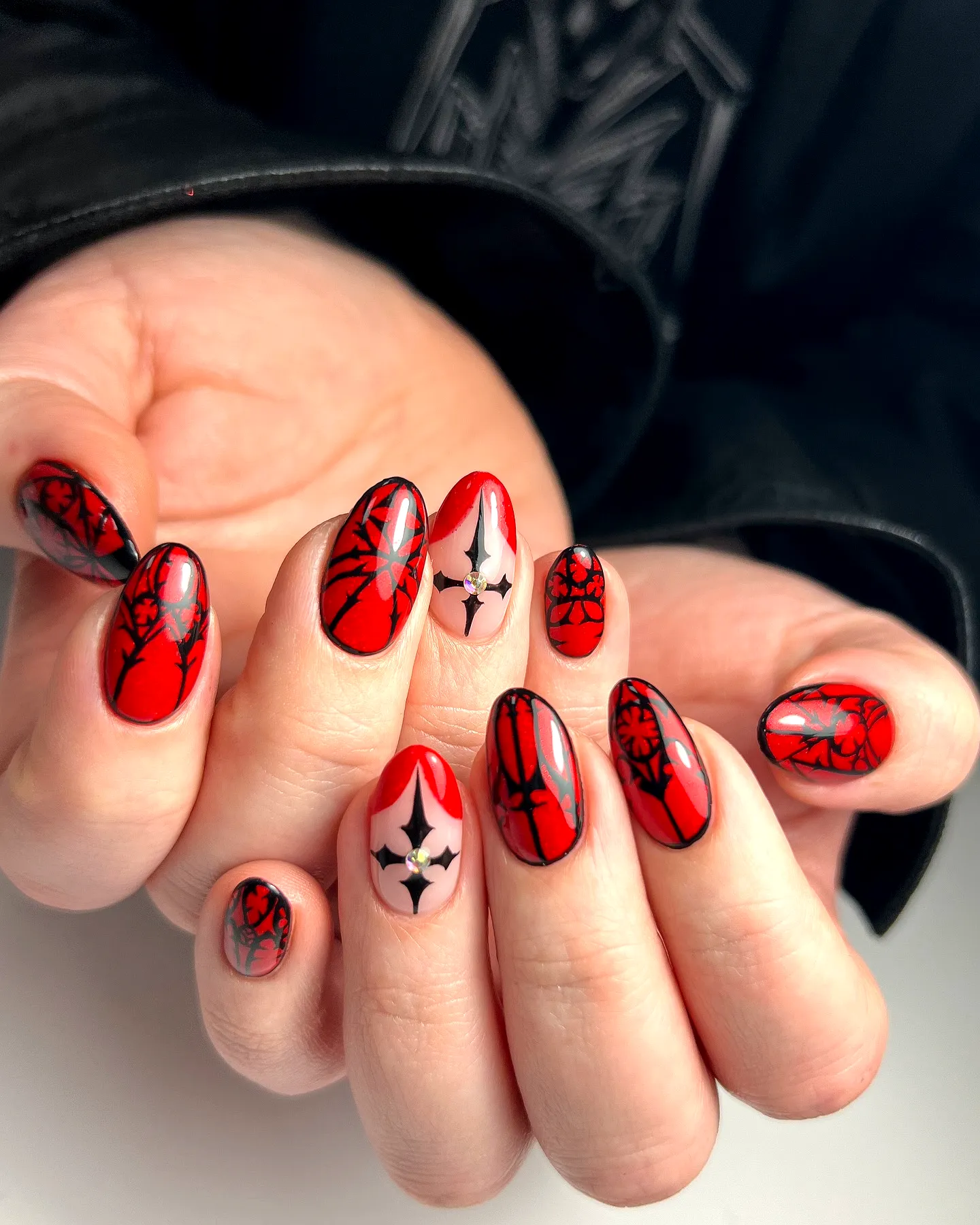 Cute Almond Shaped French Heart Nails with Deep Red and Light Pink Colors and Intricate Floral Patterns