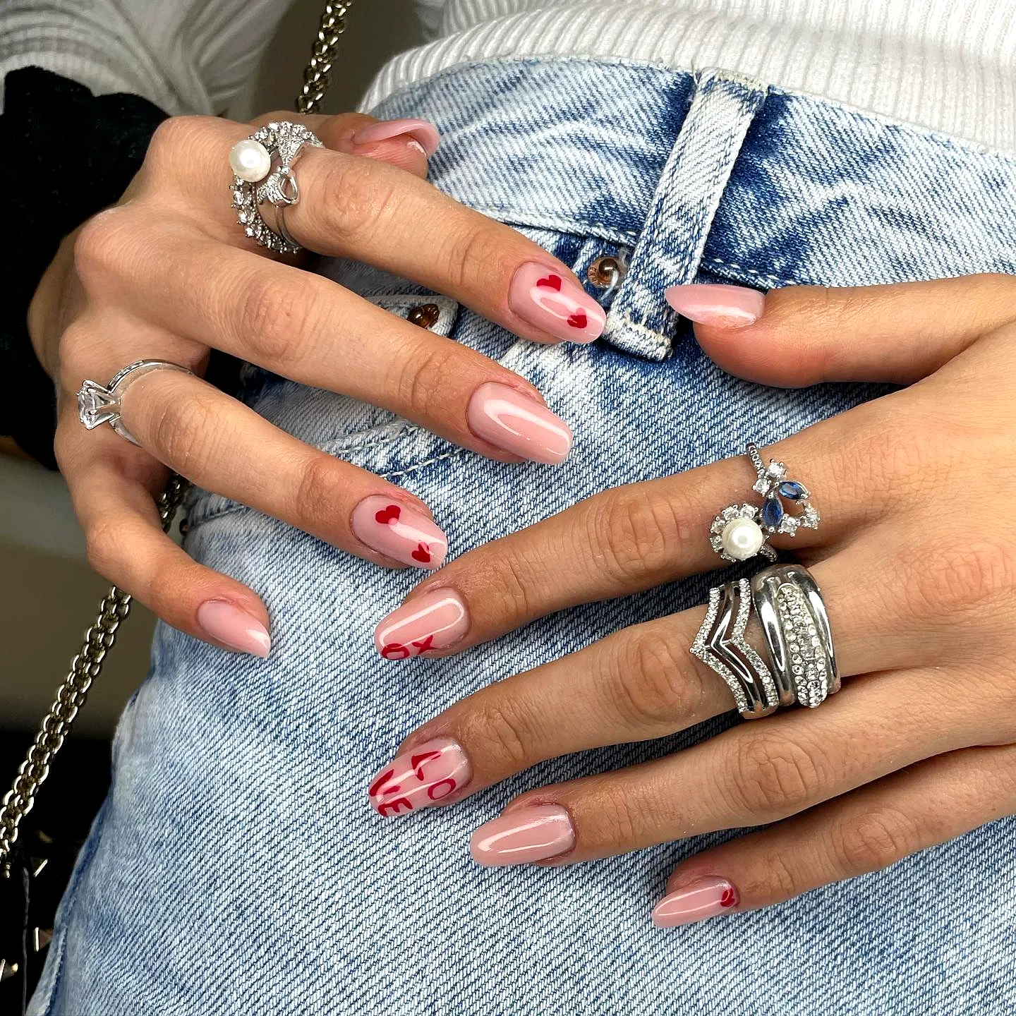 Cute Almond Shaped Valentines Day Nails with Light Pink Base Romantic Hearts and Chic Letter Art