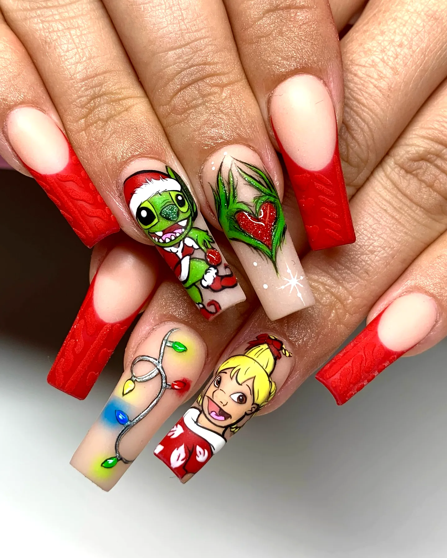 Cute Festive Grinch Nails in Elongated Coffin Shape with Holiday Characters and Glossy Finish