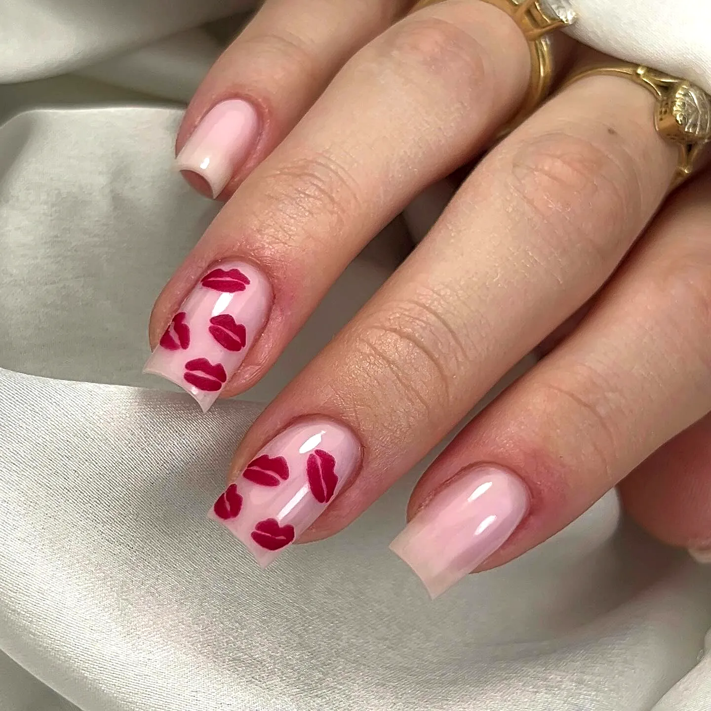 Cute Light Pink Square Valentines Day Nails with Playful Red Lip Prints