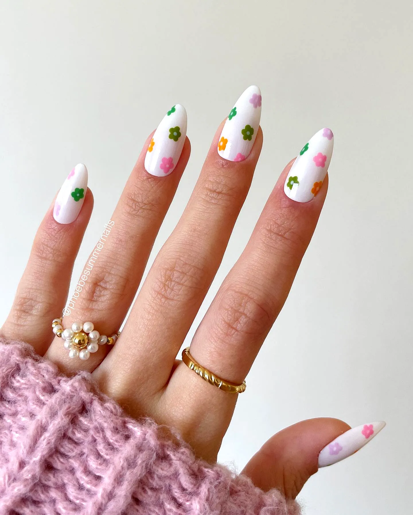 Cute Long Pointed Tropical Nail Designs with Glossy White Base and Colorful Floral Patterns