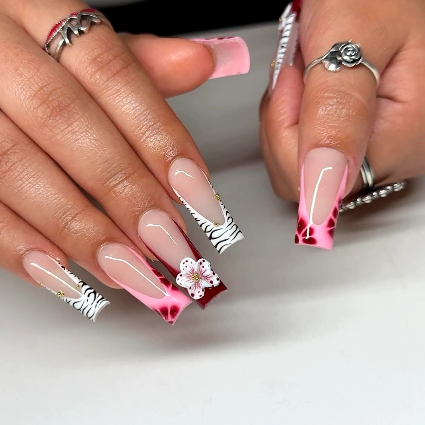 Cute Long Square Zebra Print Nails with Pink and Red Gradient Tips and Floral Accents