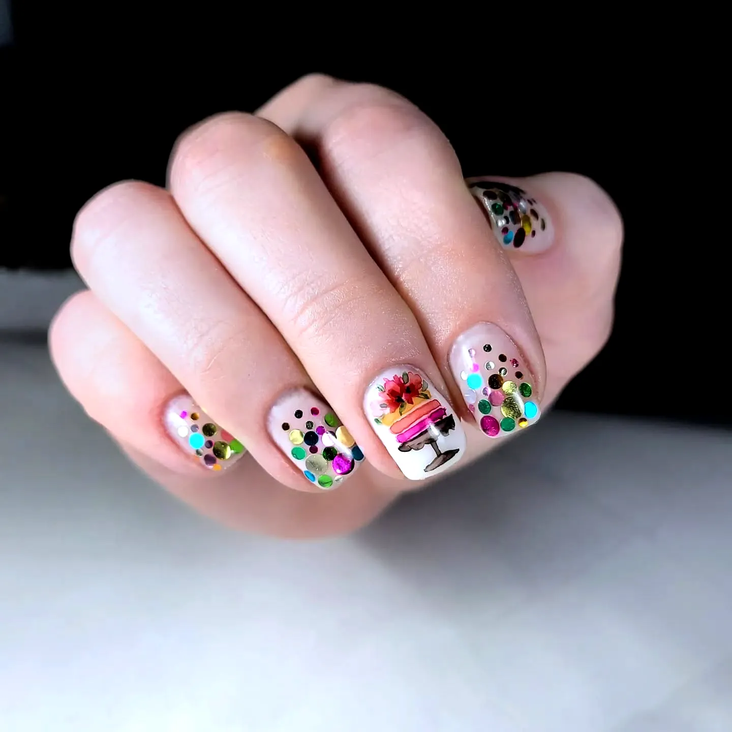 Cute Oval Birthday Cake Nails with Colorful Confetti and Cupcake Design