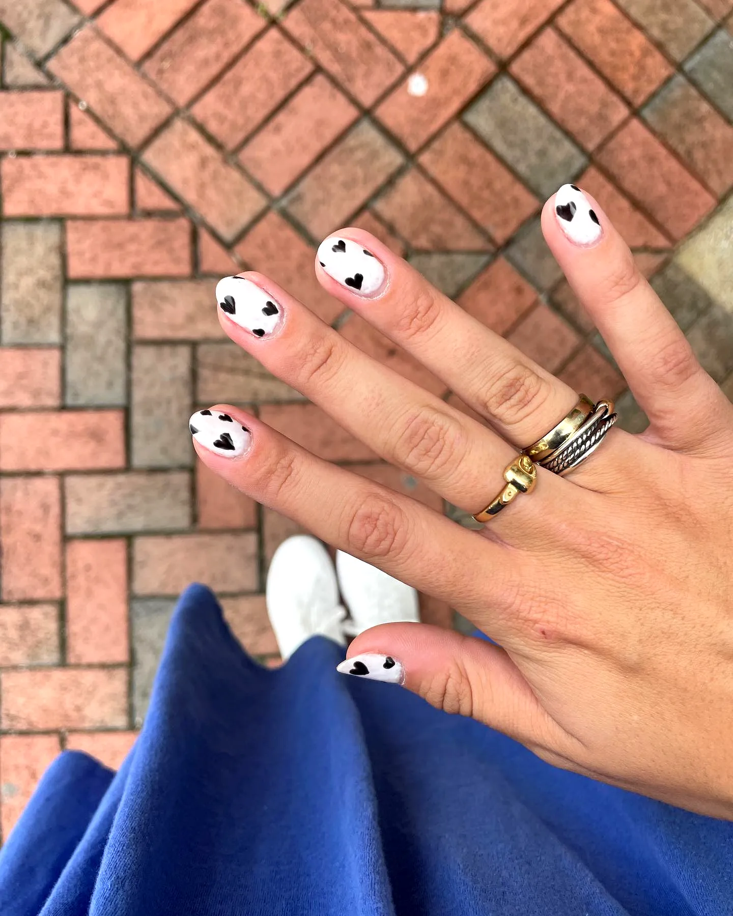 Cute Oval Pale Pink Ring Finger Heart Nails with Trendy Minimalist Art