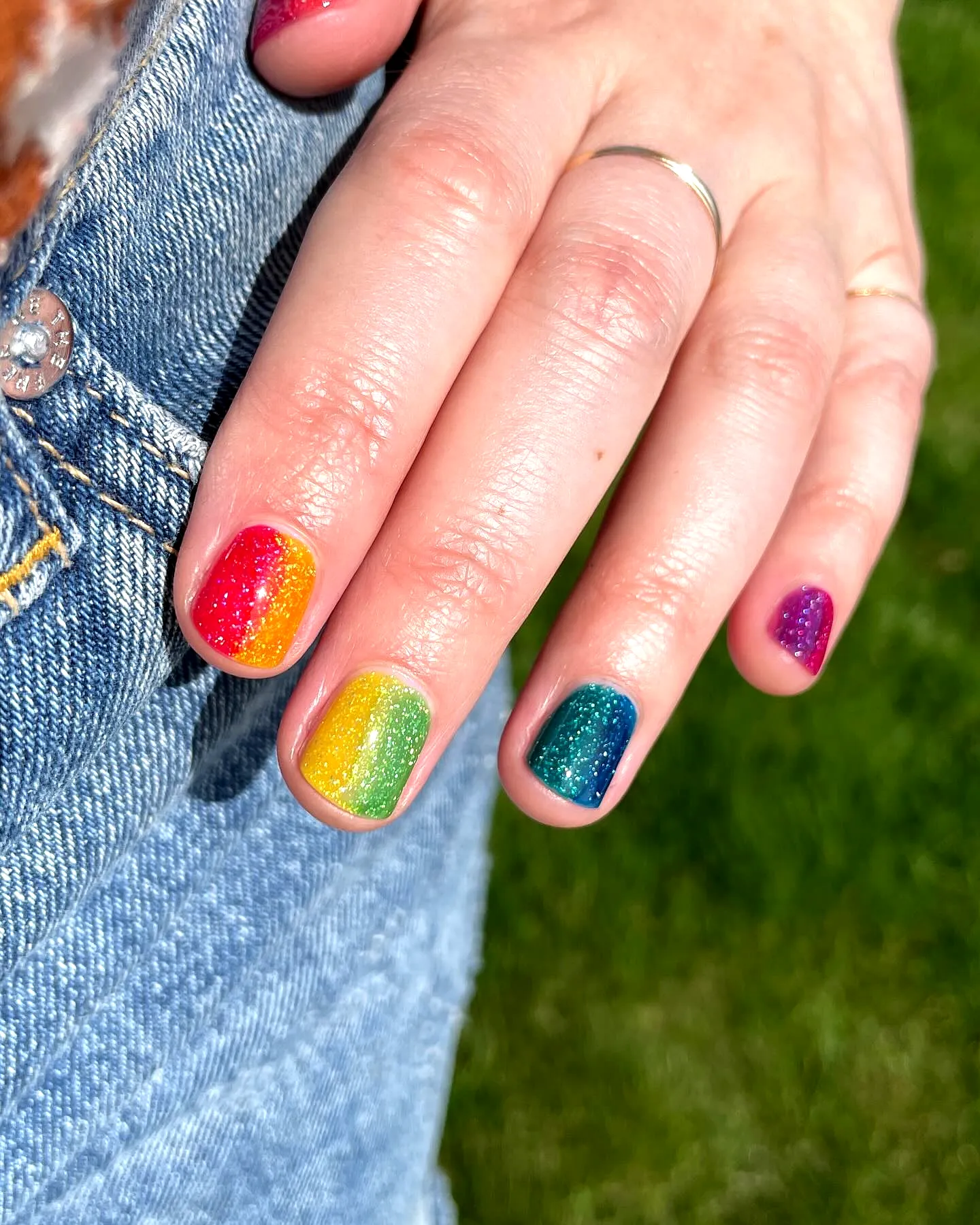 Cute Rounded Pride Nails with a Vibrant Glitter Gradient
