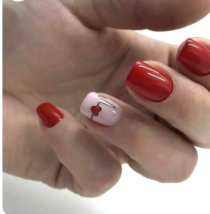 Cute squared off ring finger heart nails with red and pale pink colors featuring glossy finish and charming silver stripe design