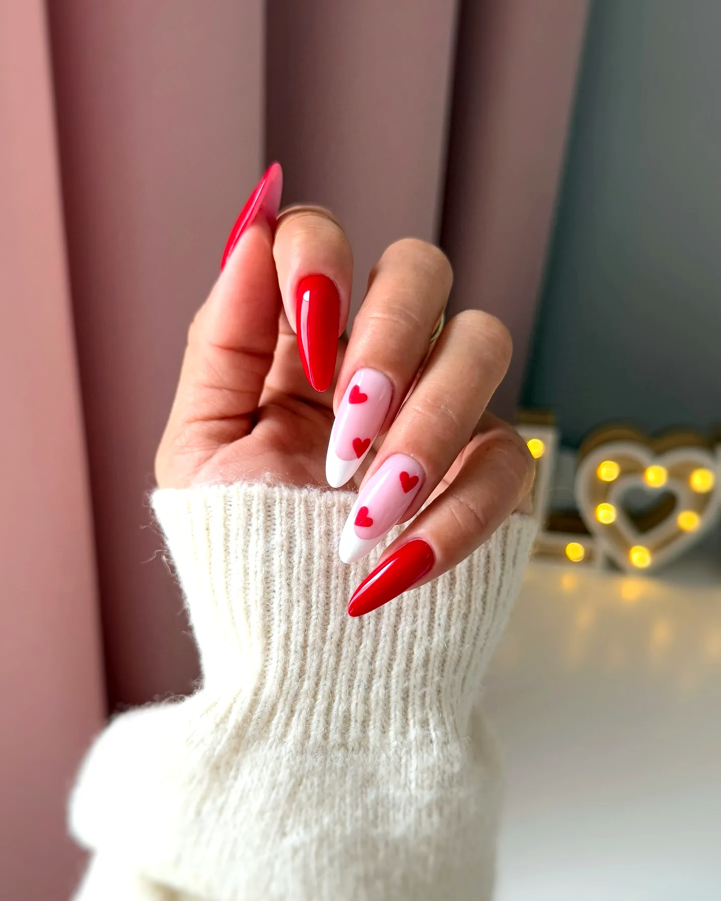 Cute Valentines Day Nails in Elongated Stiletto Shape with Romantic Red and White Heart Designs