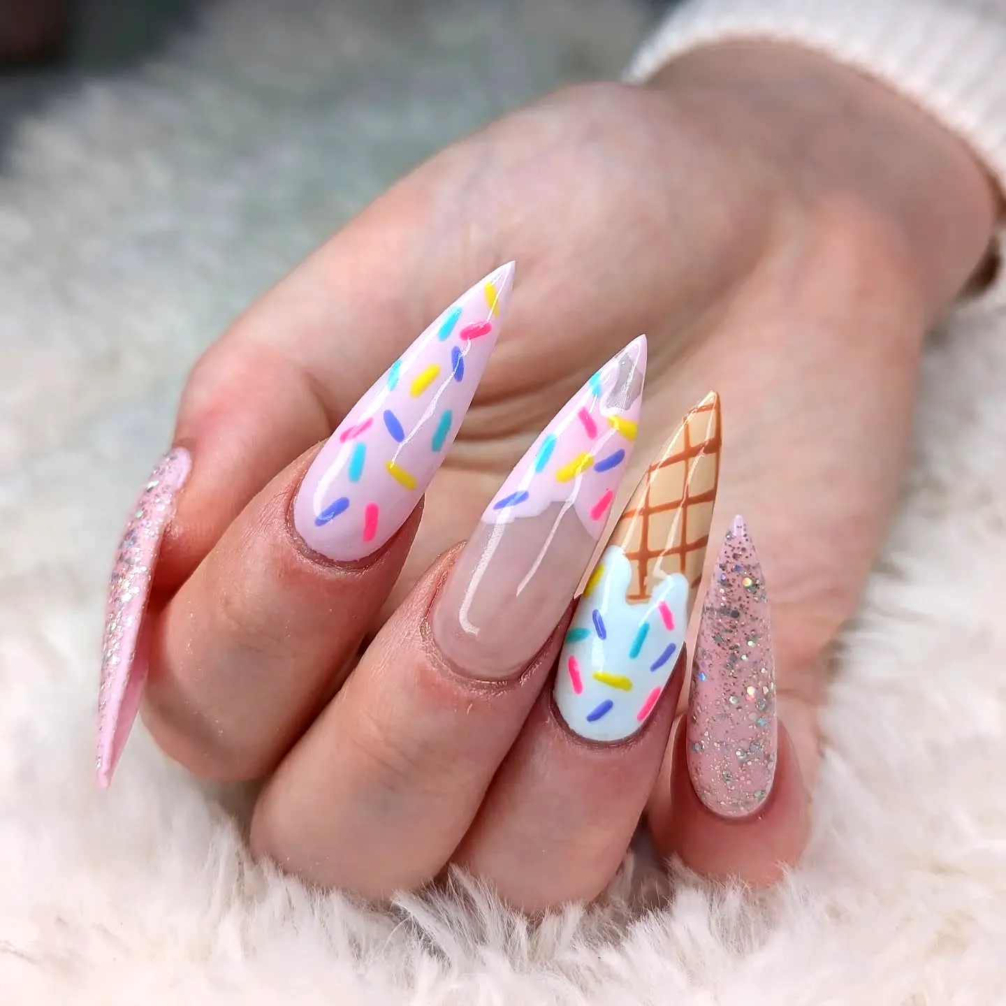 Delightful Pastel Birthday Cake Nails with Stiletto and Almond Shapes Featuring Sprinkles and Glitter