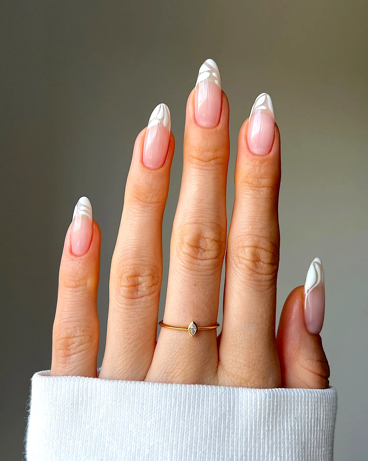 Elegant Almond Wedding Nails with Classic Nude French Tips and Chic Marbled Swirls