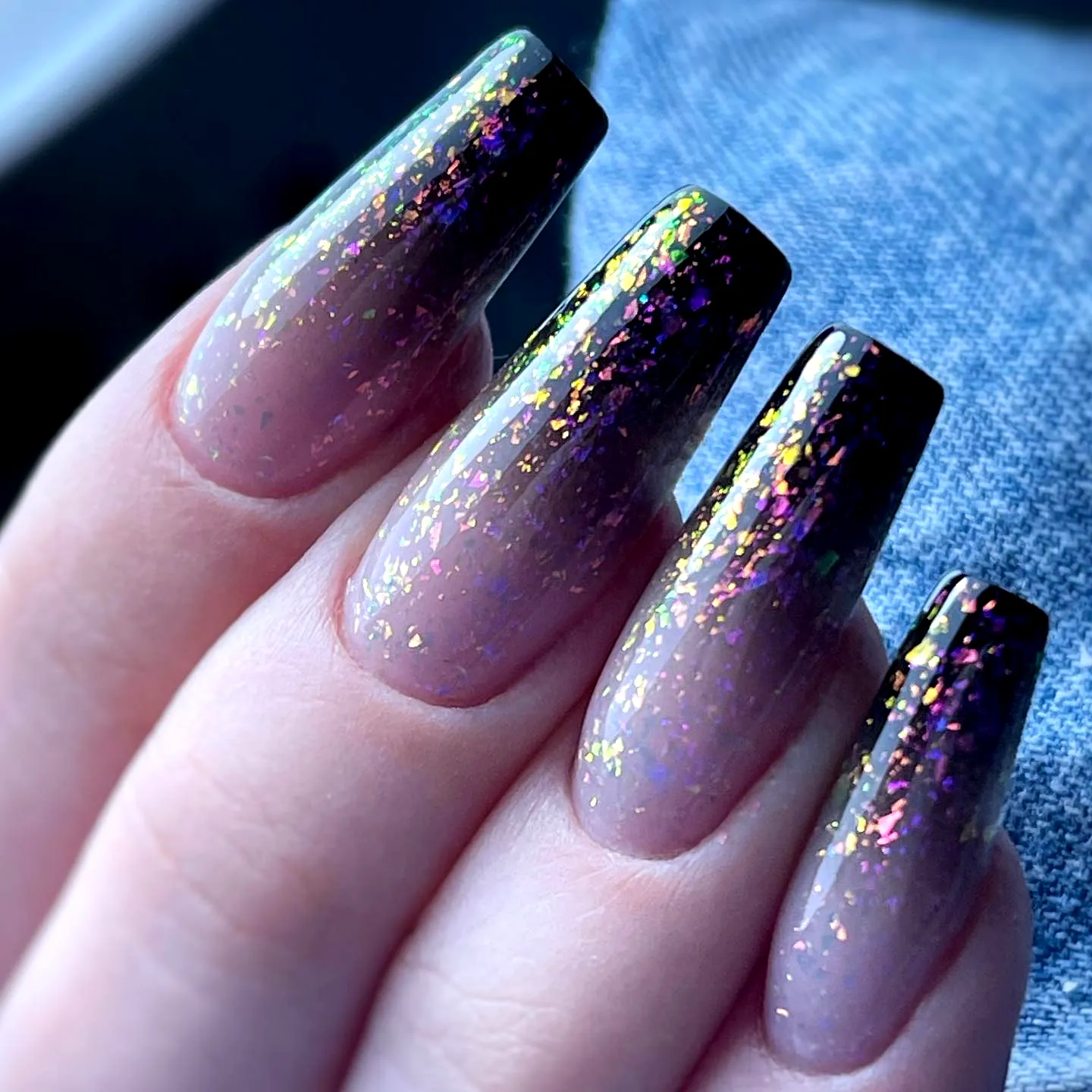 Elegant coffin ballerina nails with gradient pink to purple and iridescent glitter
