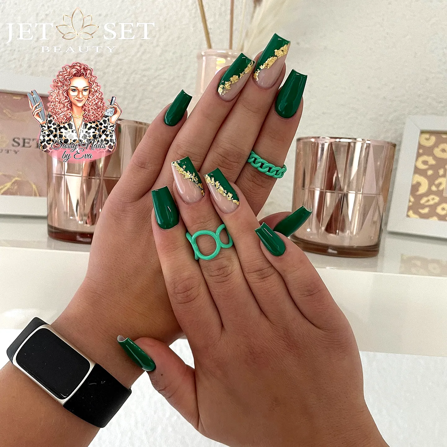 Elegant long square green nails with gold foil accents and modern nail art