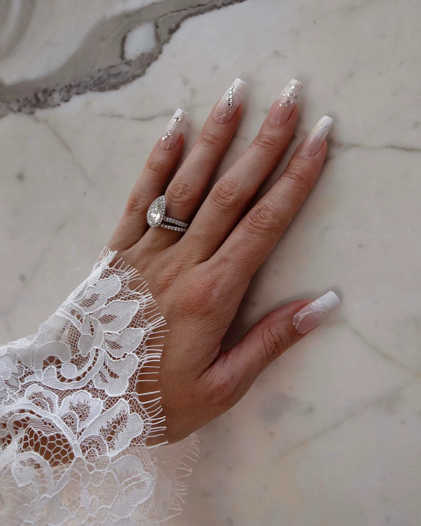 Elegant Square Rhinestone Nail Designs with Classic French Tips and Lace Accents in Soft Nude