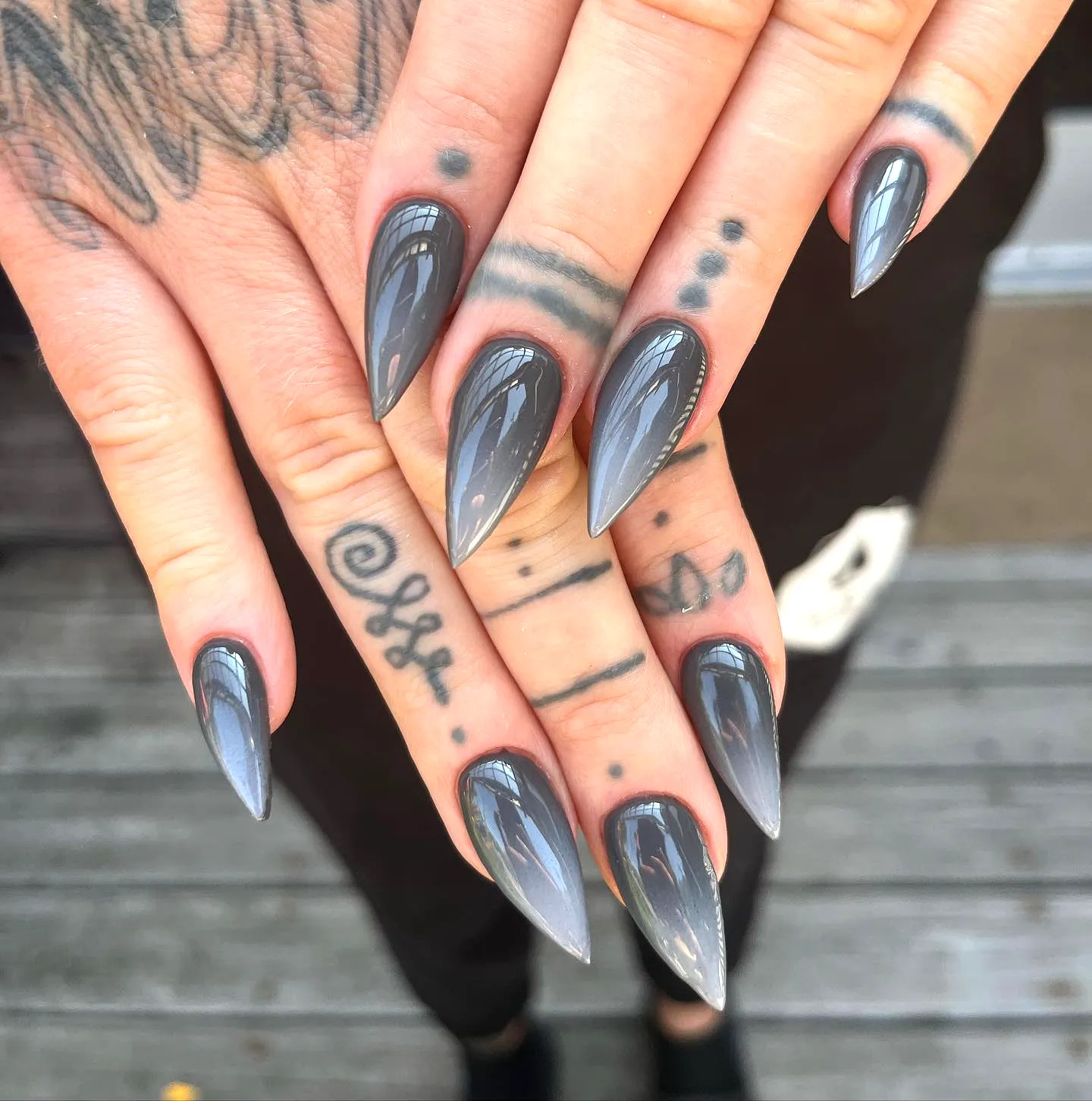 Elegant Stiletto Gray Nails with Glossy Ombre Transition