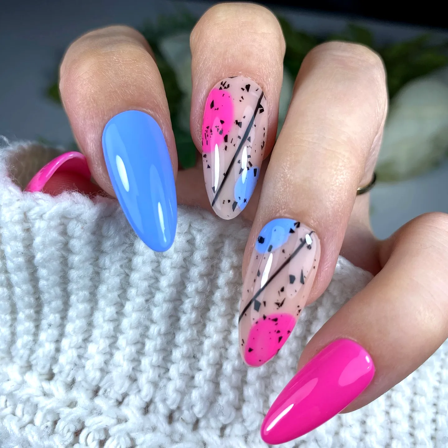 Playful Almond-Shaped Neon Nails with Glossy Colors and Abstract Art Elements
