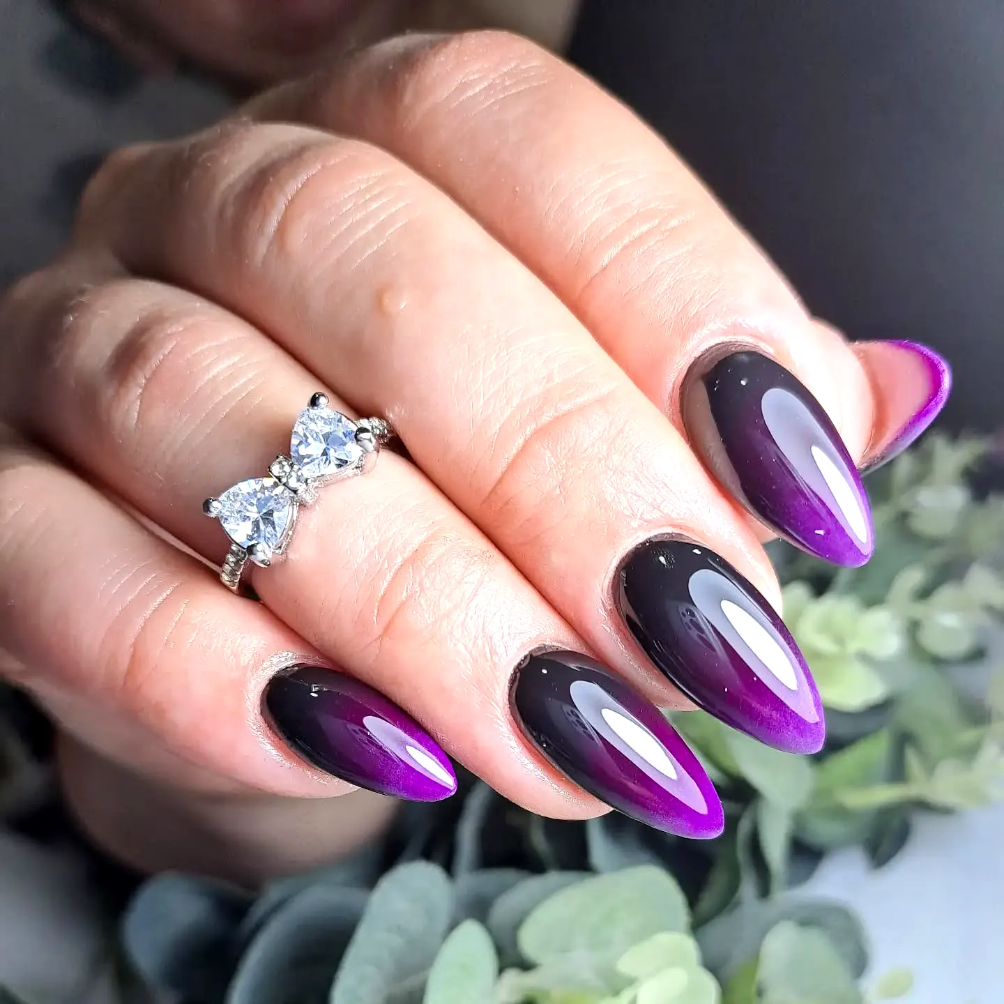 Stunning Almond Purple Nails with Gradient Blend and Glossy Finish
