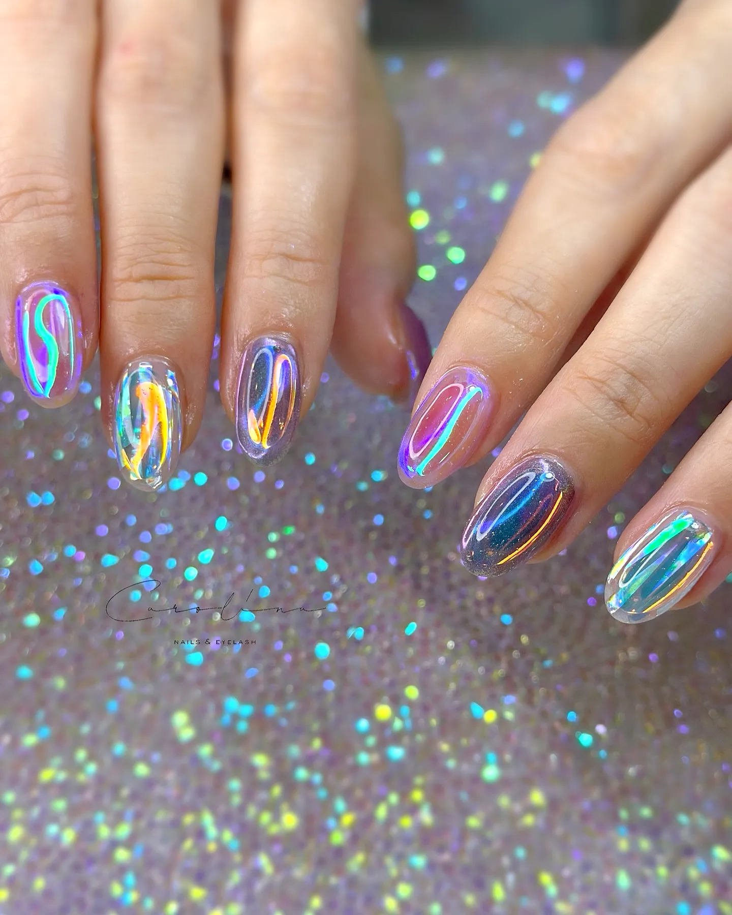 Stunning Almond Shaped Aurora Nails with Colorful Holographic Waves in Iridescent Shades